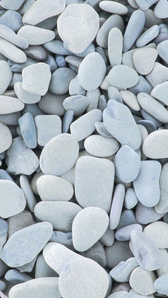 A close up of many small stones - Gray