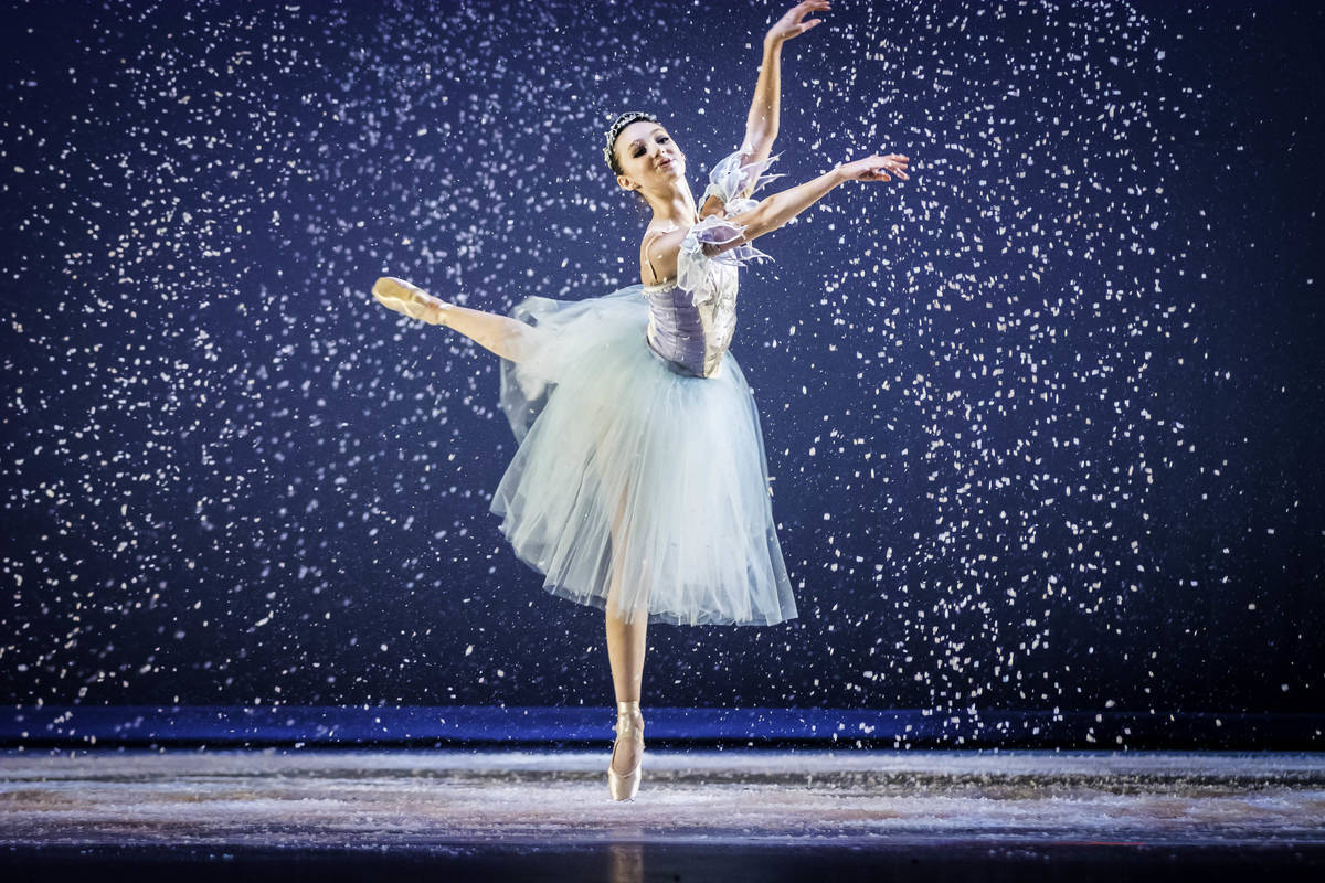 A ballerina in blue tutu is dancing on stage - Ballet, dance