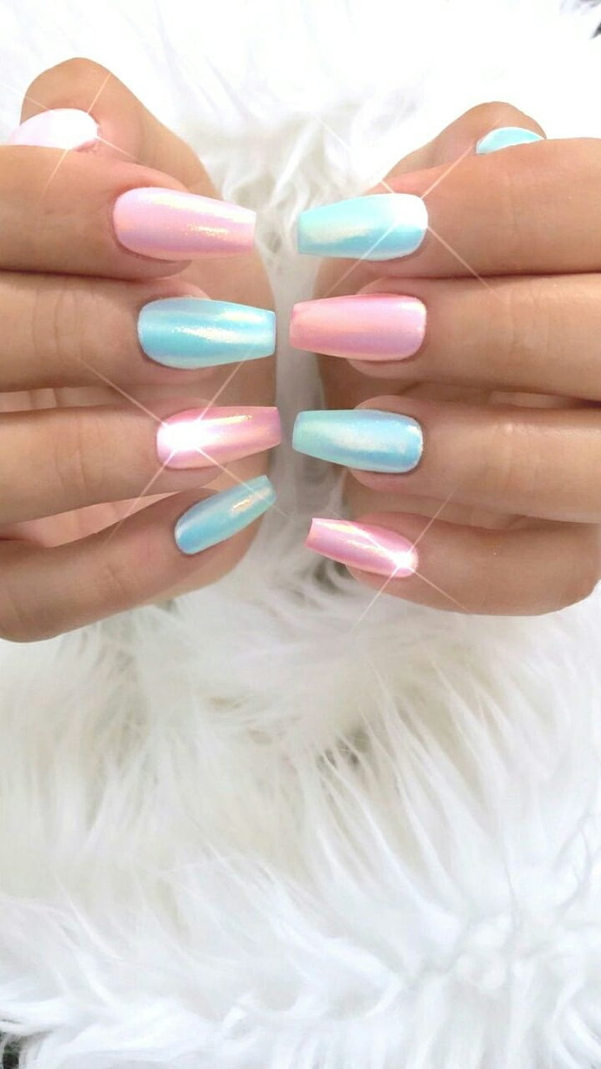 A woman with pink and blue nails on her hands - Nails