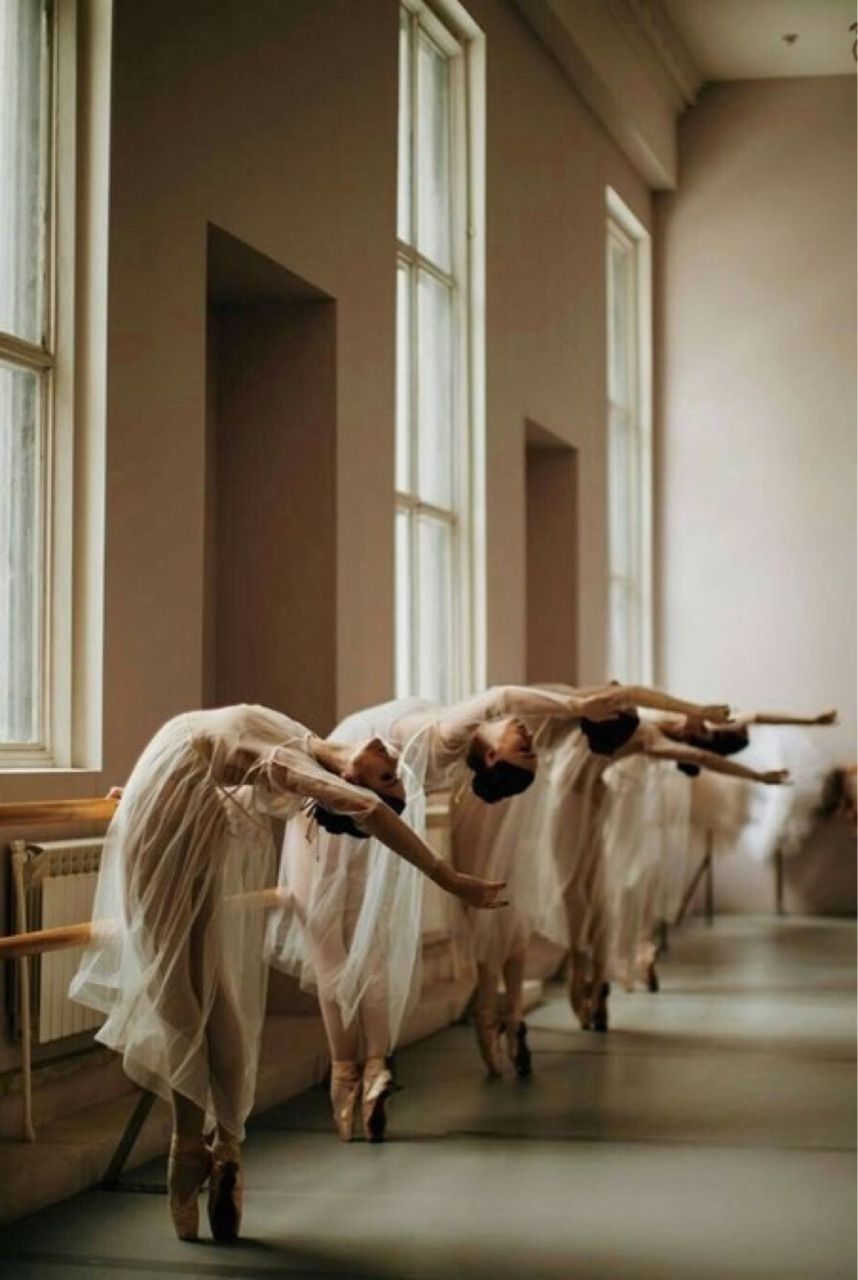 A group of ballerinas in white dresses are practicing - Ballet
