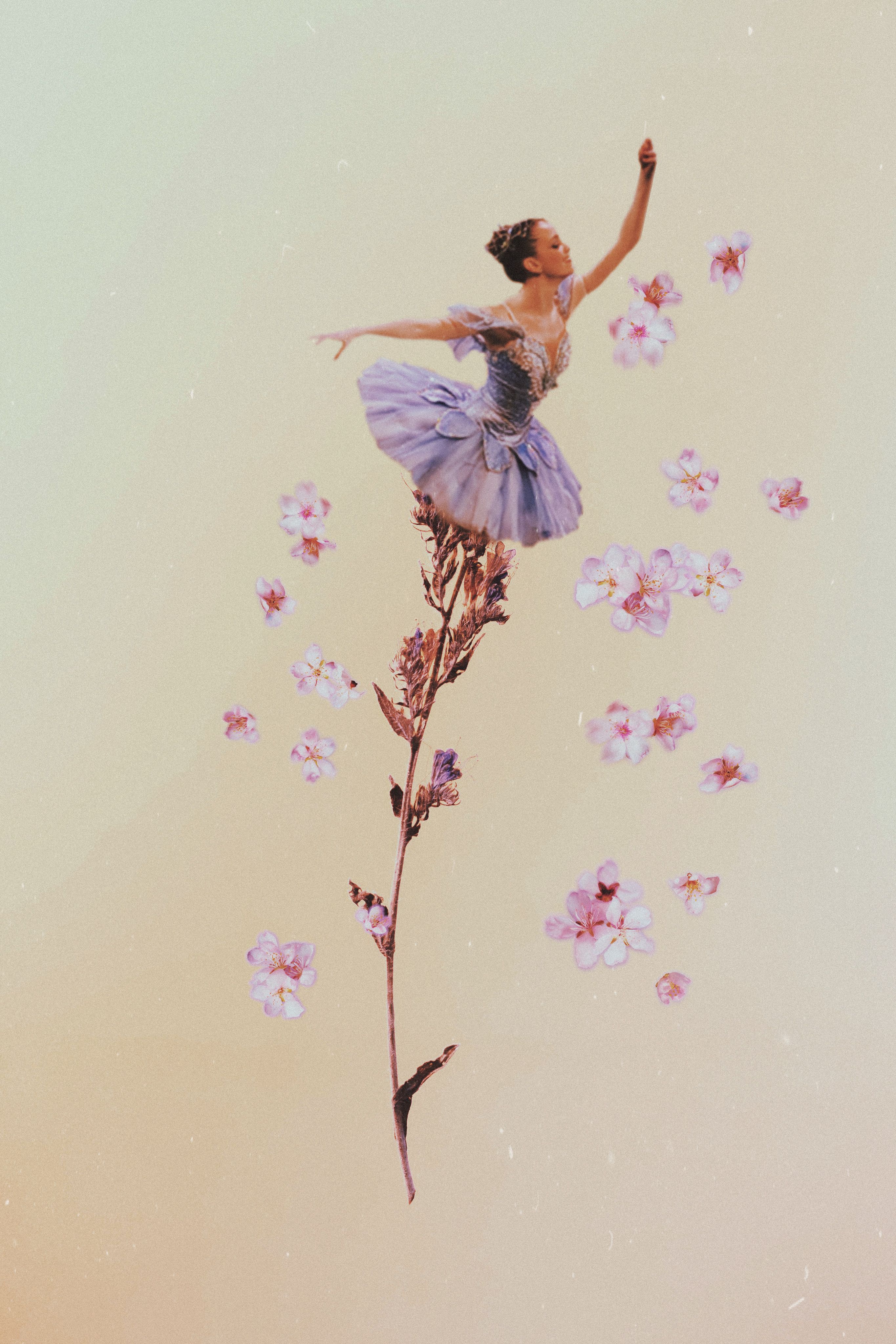 A woman in ballet shoes is flying through flowers - Ballet