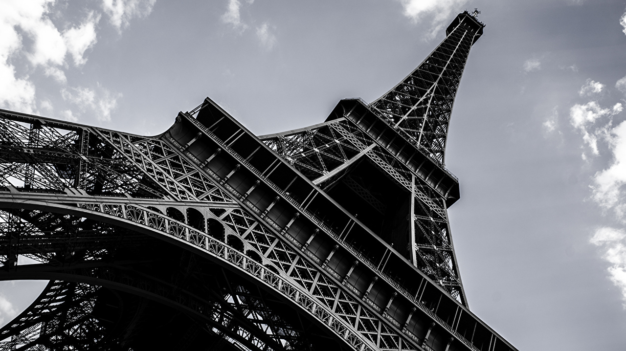 A black and white photo of the Eiffel Tower - Eiffel Tower, Paris