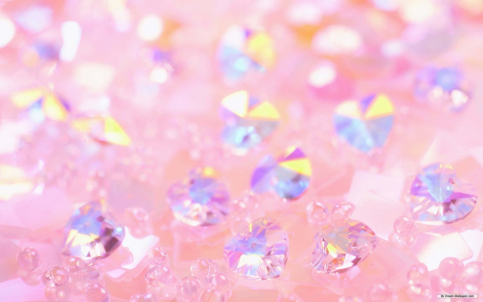 A collection of pink and purple crystals on a pink background - Diamond
