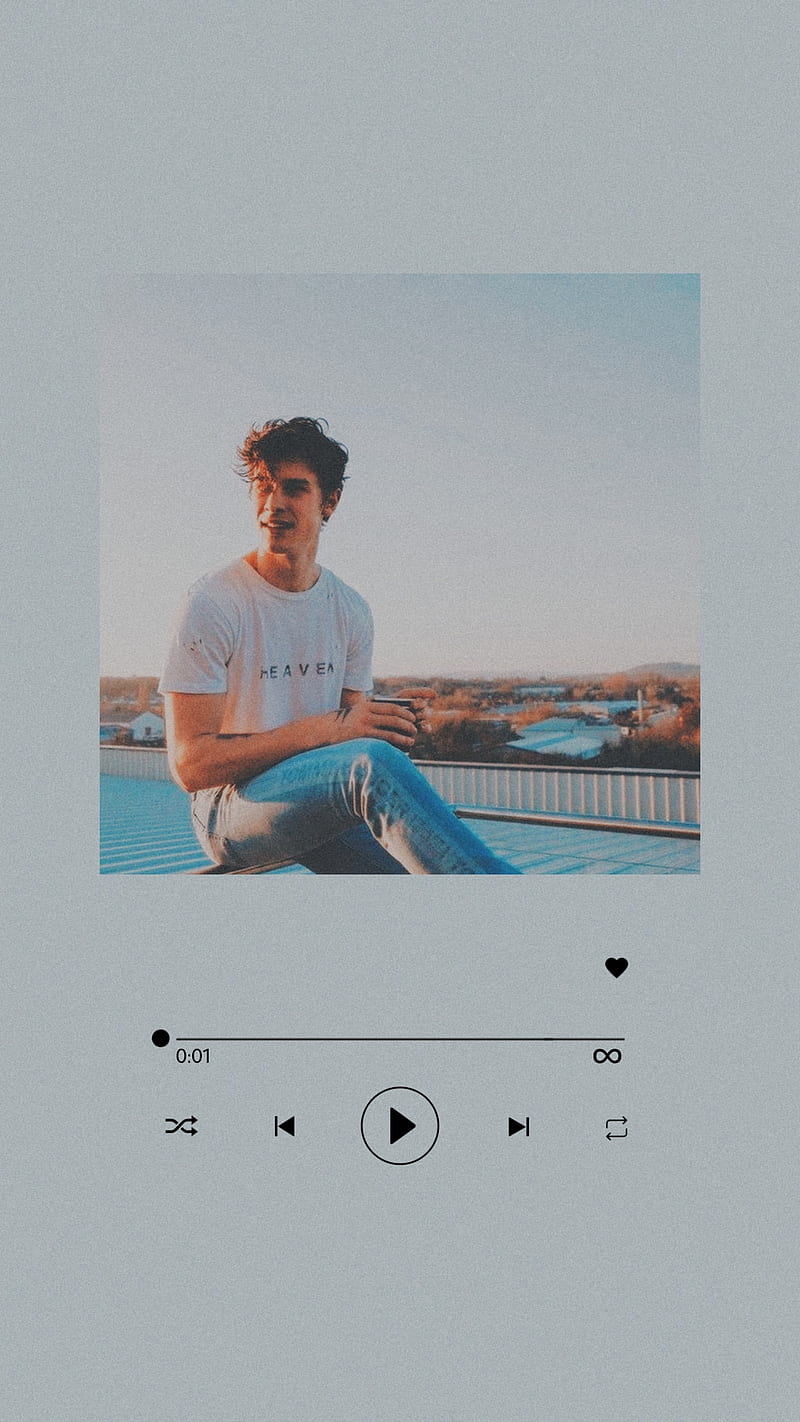 Aesthetic background of a man sitting on a roof with a music player at the bottom - Shawn Mendes