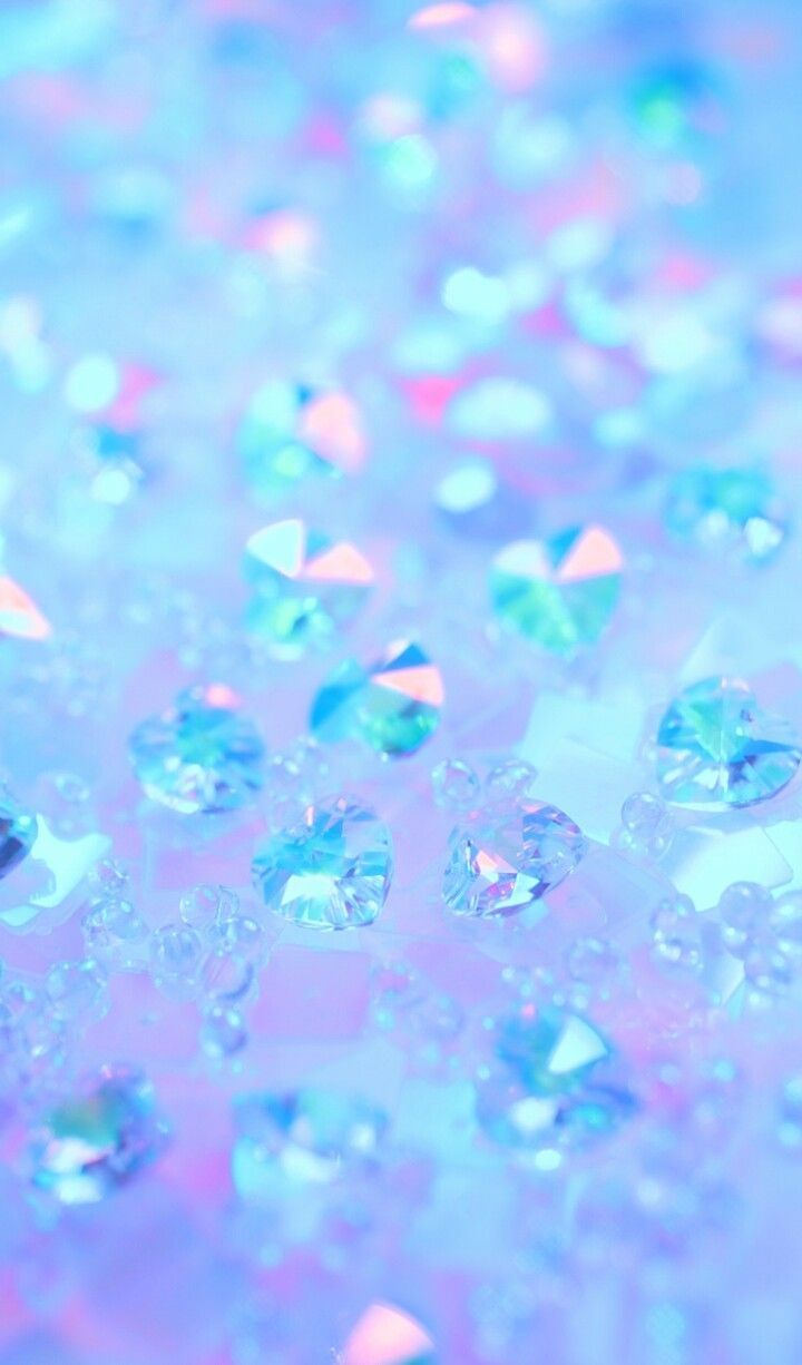 A close up of some blue and pink crystals - Diamond