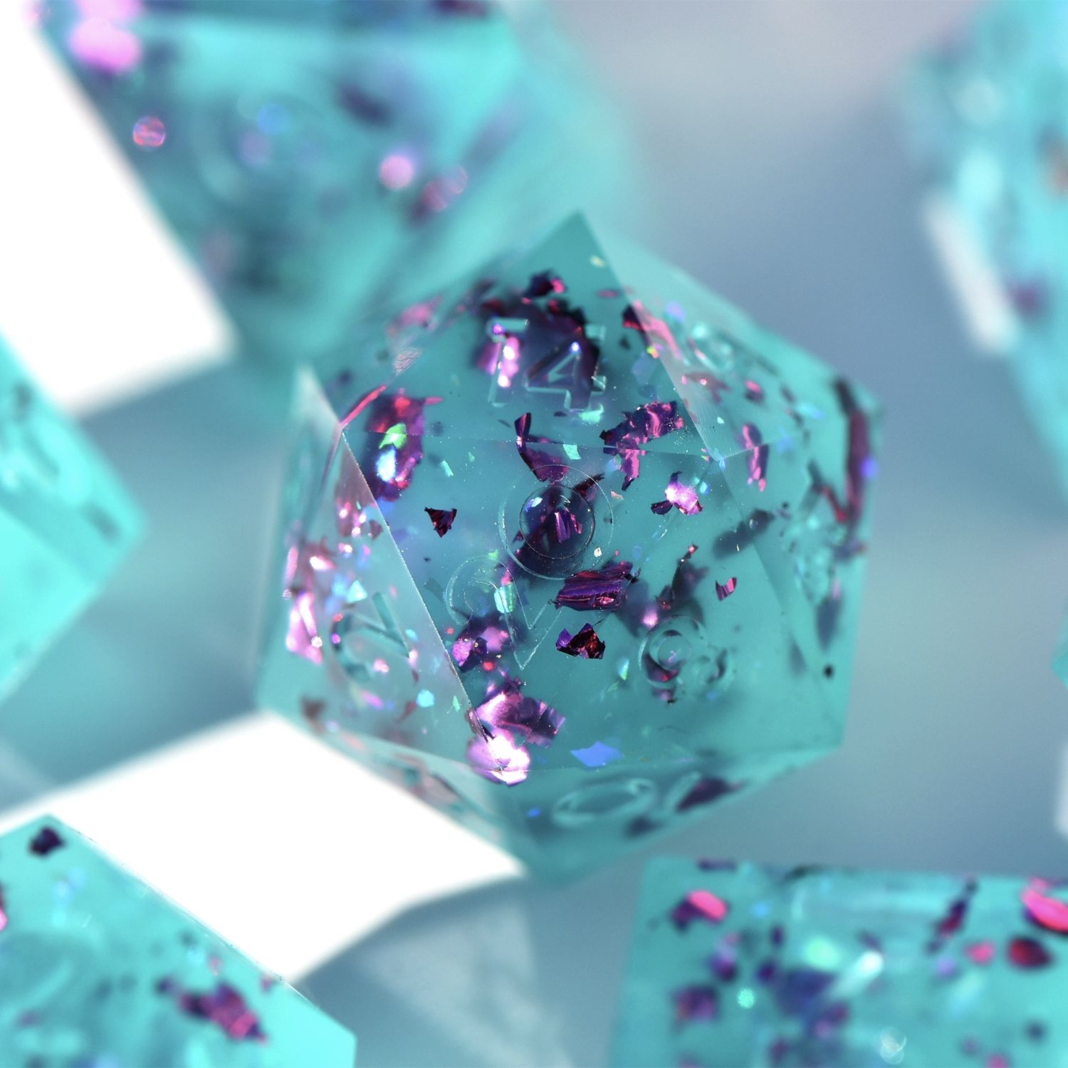 A group of blue and purple dice - Diamond