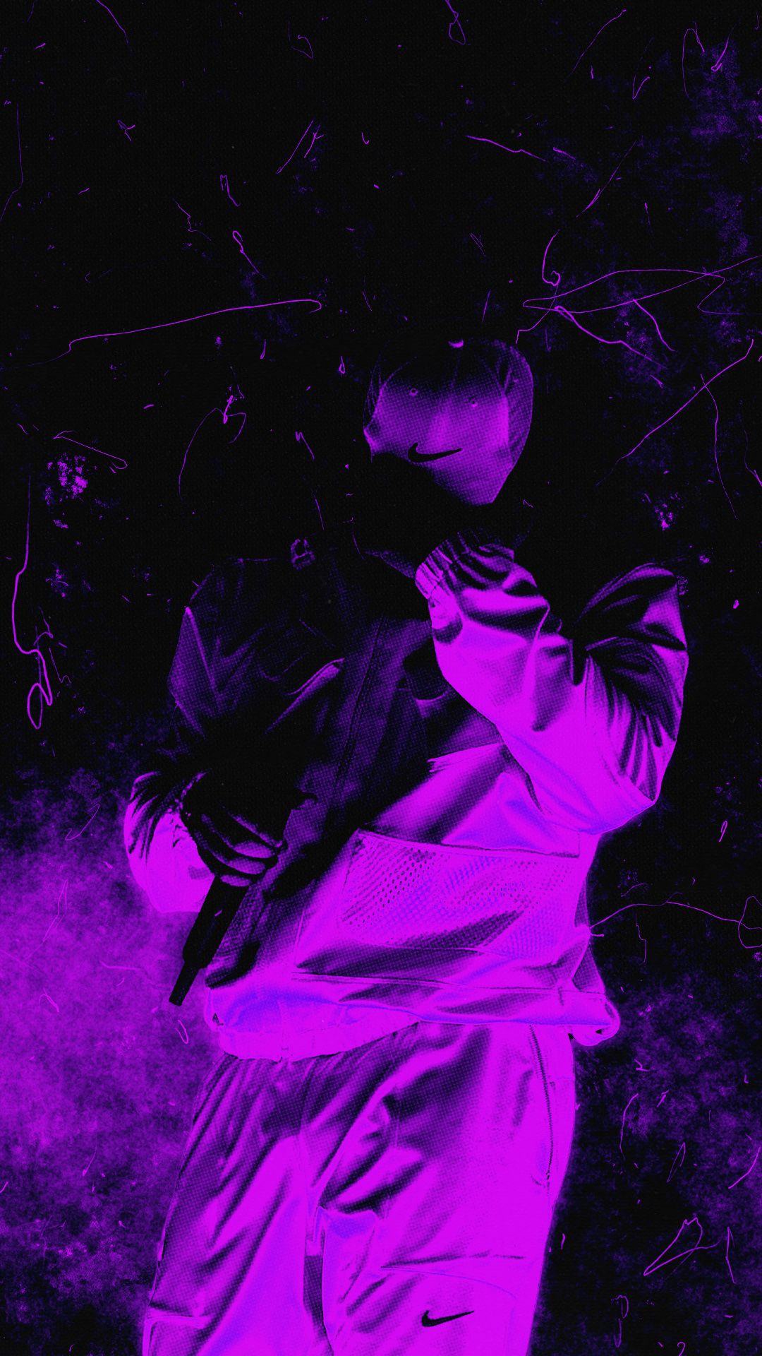 A man in purple clothes holding his phone - Drake