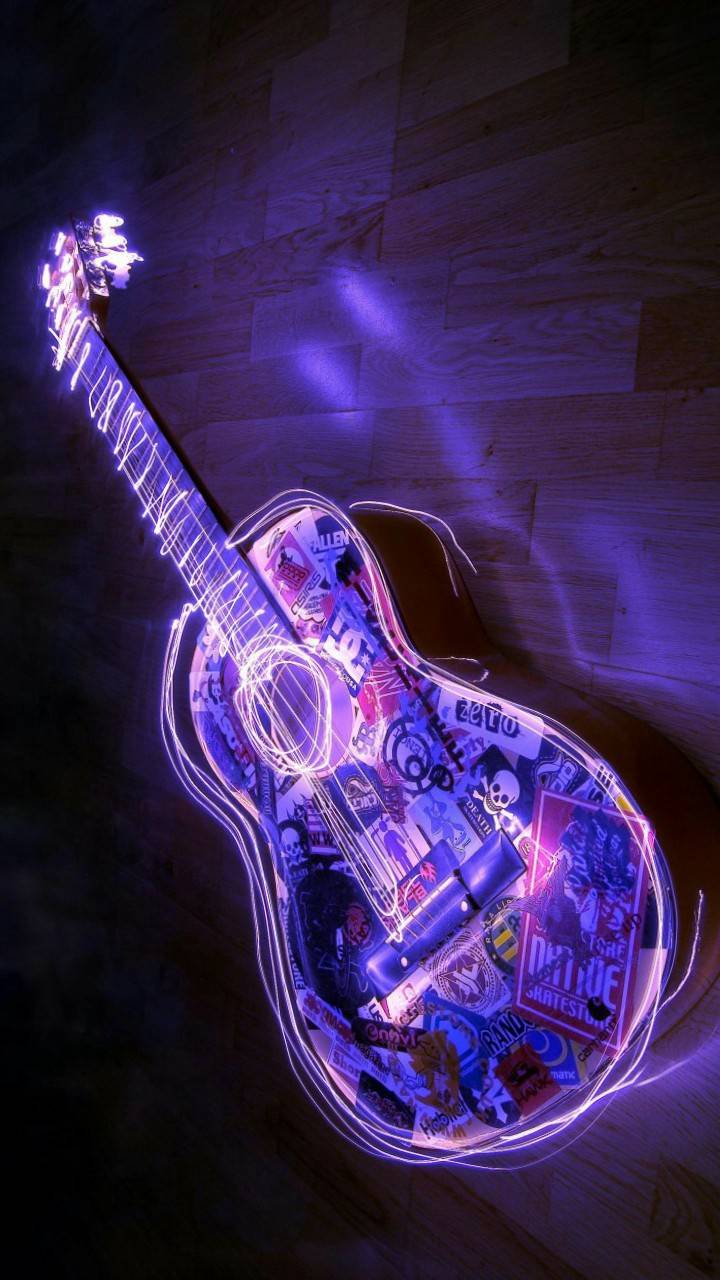 A purple guitar with neon lights on it - Guitar