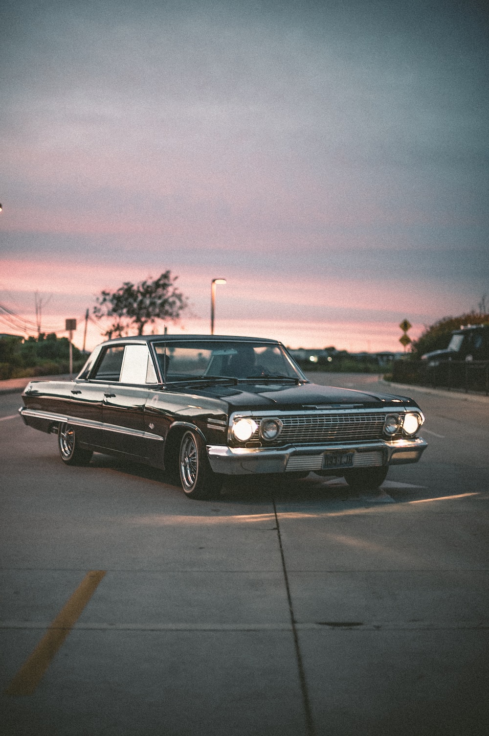 A car is parked on the street - Cars