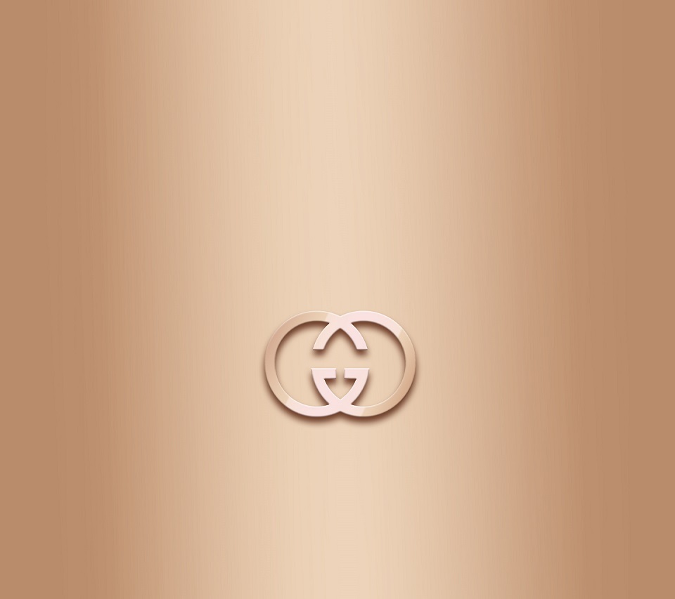 The gucci logo in gold - Gucci