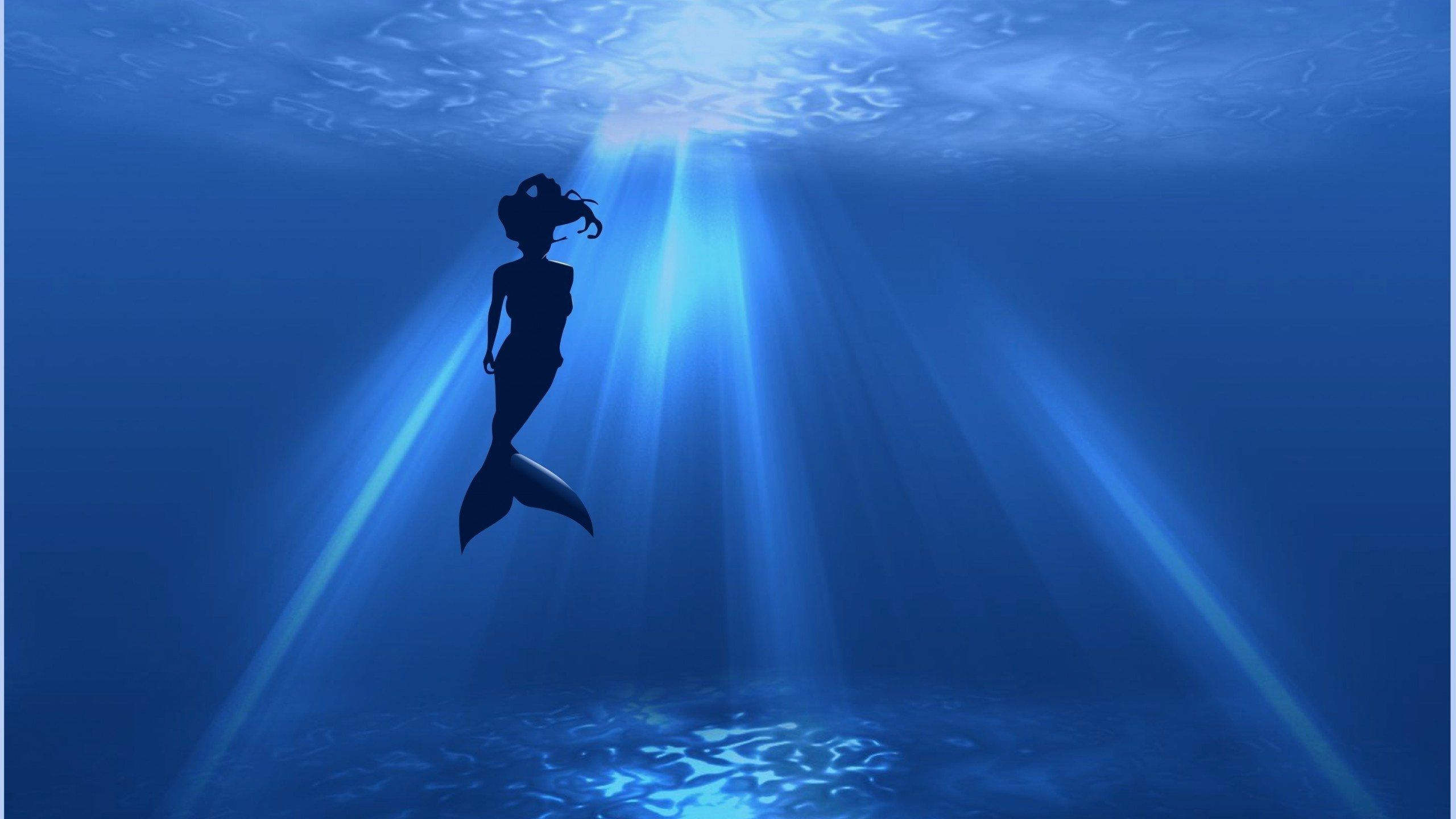 A mermaid swimming in the ocean - Mermaid