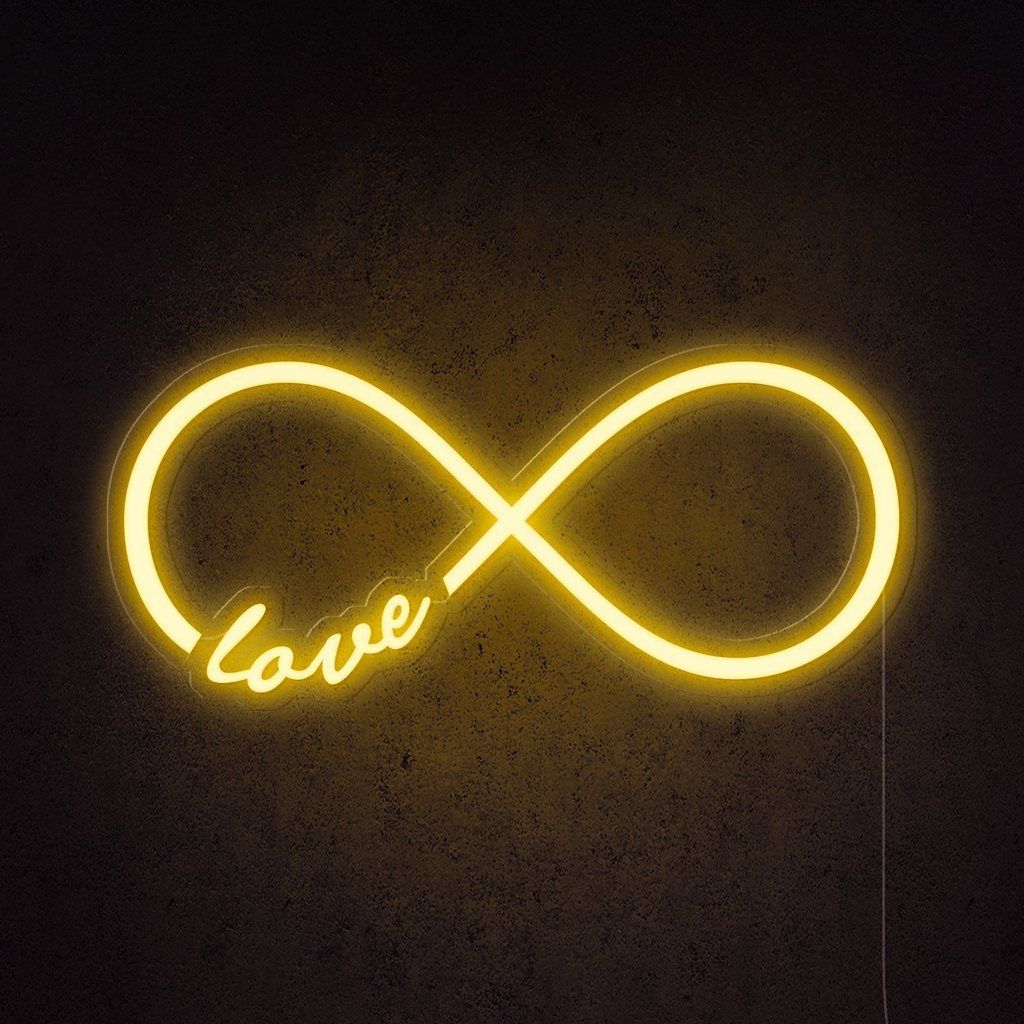 A neon sign that says love - Light yellow