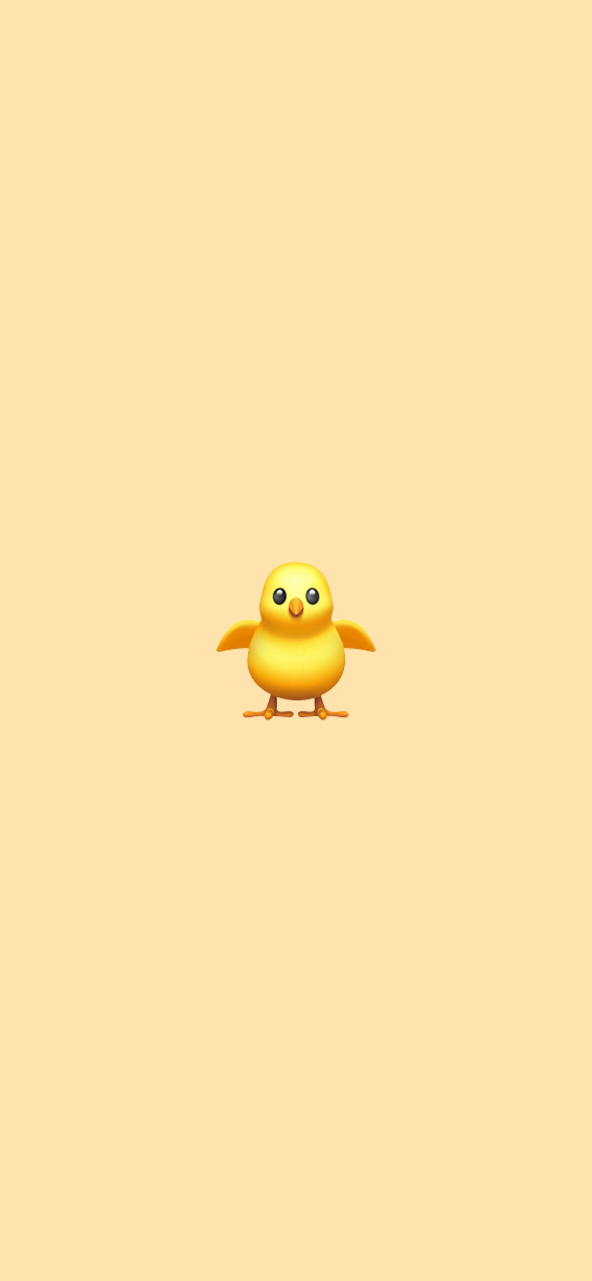 A yellow bird with big eyes on an orange background - Emoji, baby