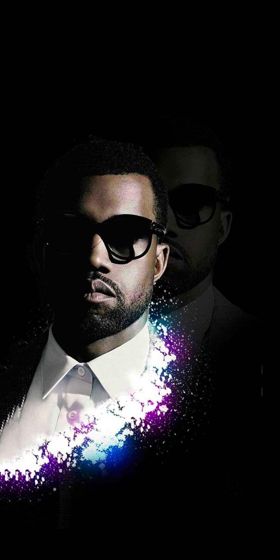 A man in sunglasses and suit - Kanye West