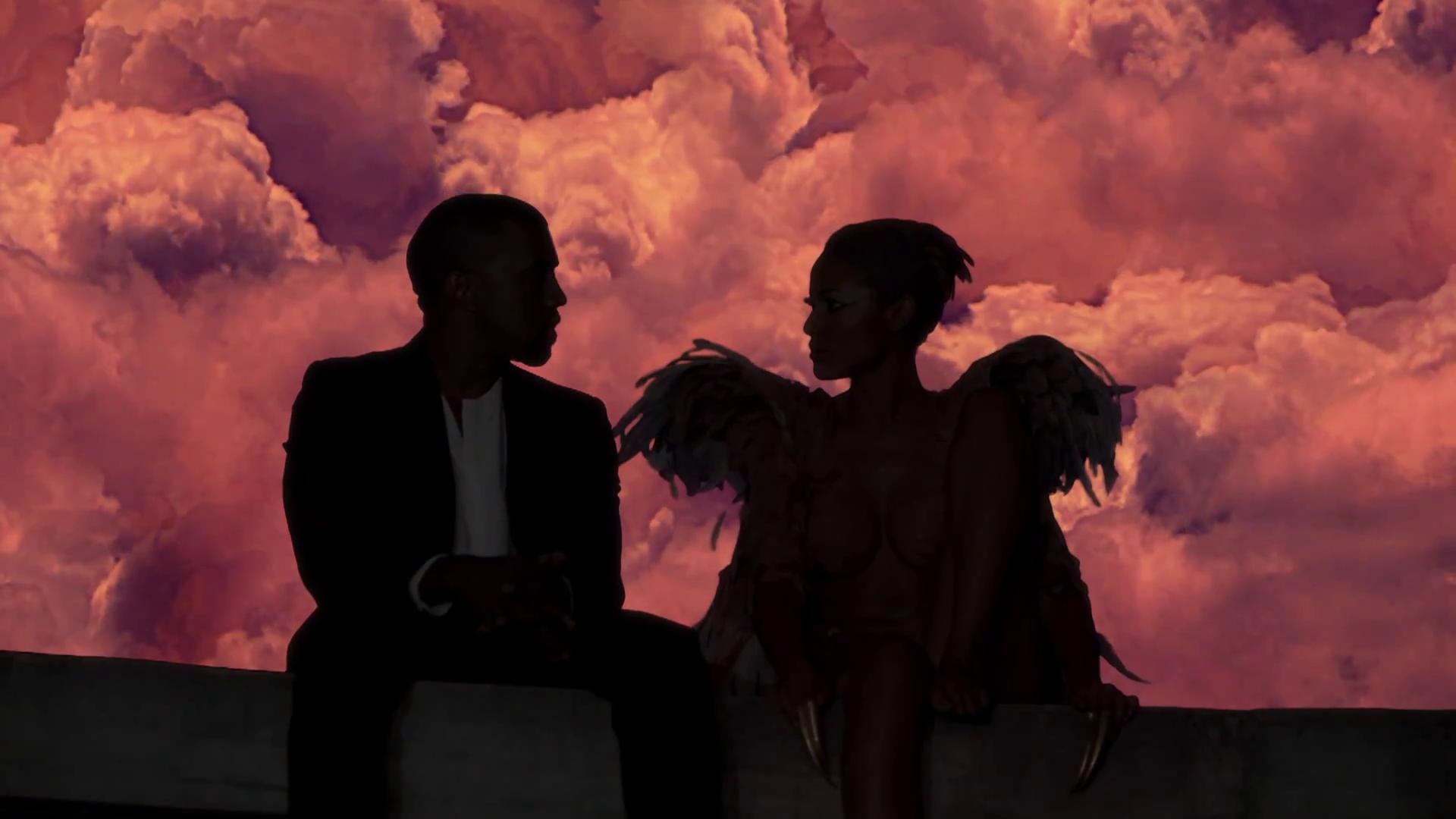 A man and woman sitting on top of something - Kanye West