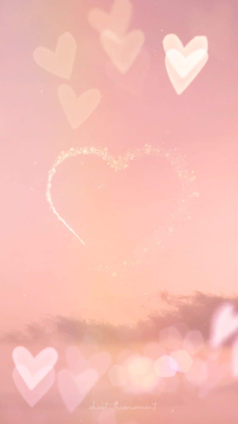 A pink sky with hearts in it - Valentine's Day