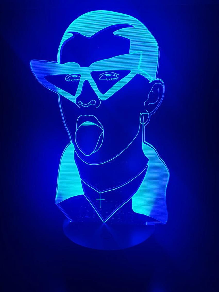 A blue light up figurine of someone with sunglasses - Bad Bunny