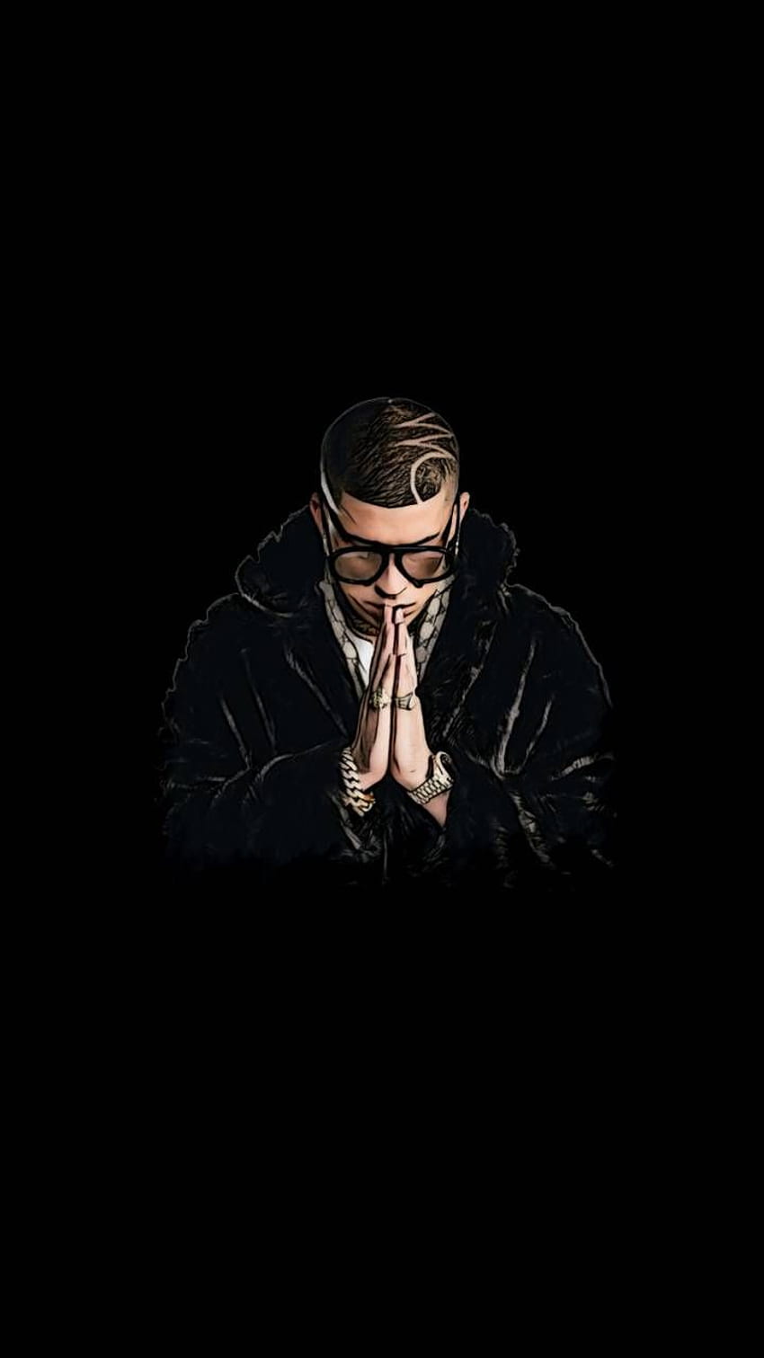 A man with glasses and black clothing praying - Bad Bunny
