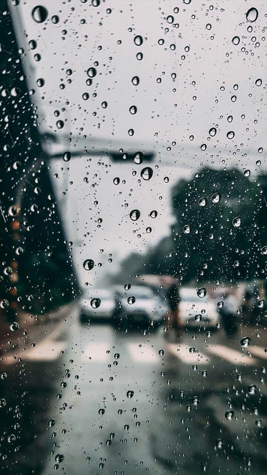 A view of the rain on an outdoor window - Rain