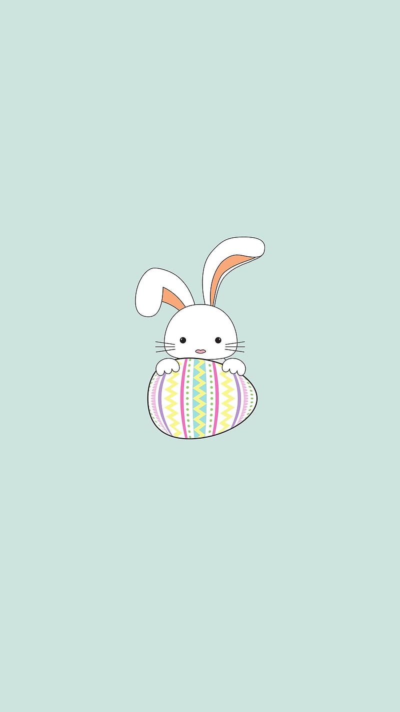 A cute easter bunny with an egg in its mouth - Easter