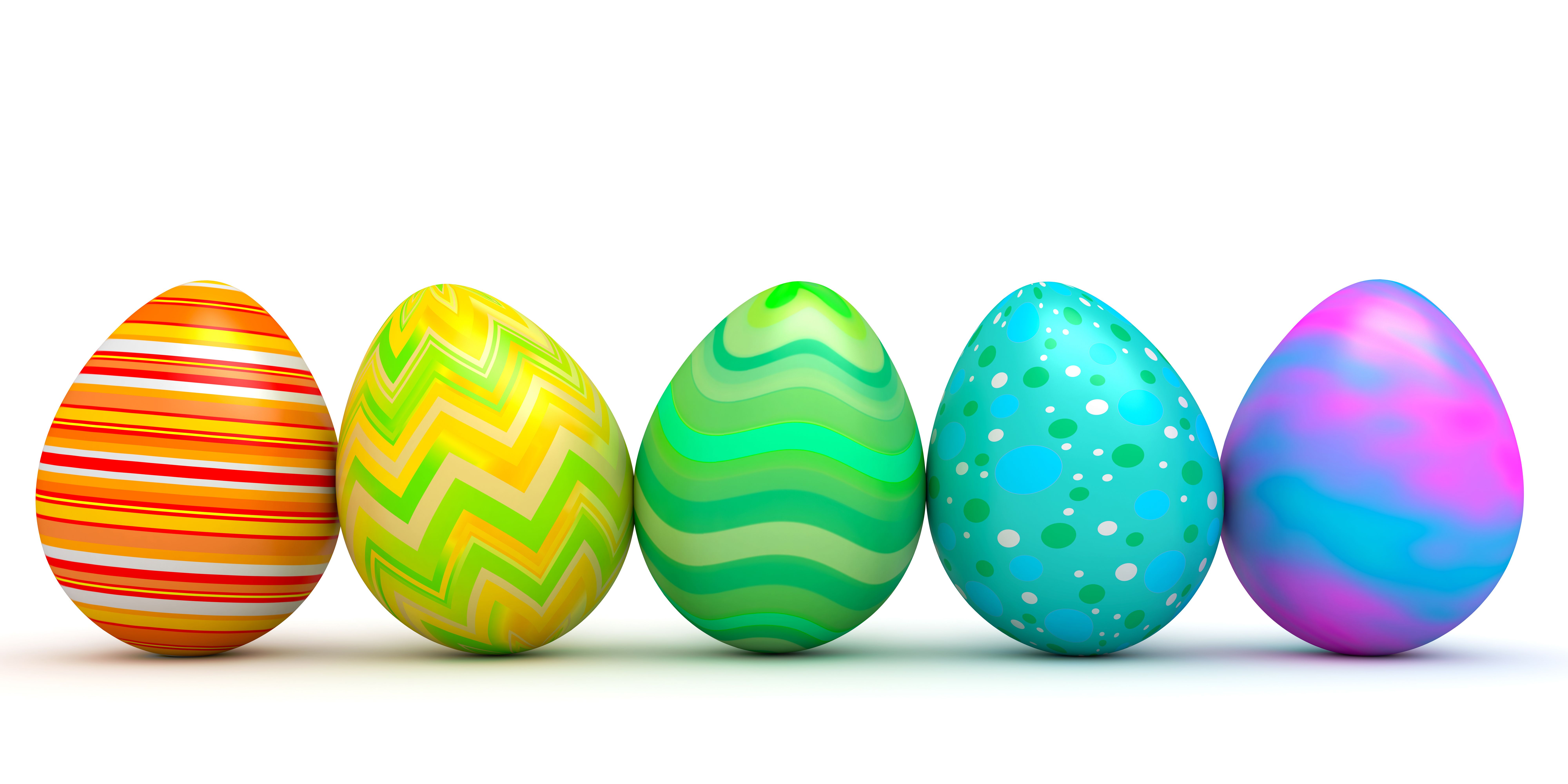 A group of colorful easter eggs are lined up - Easter