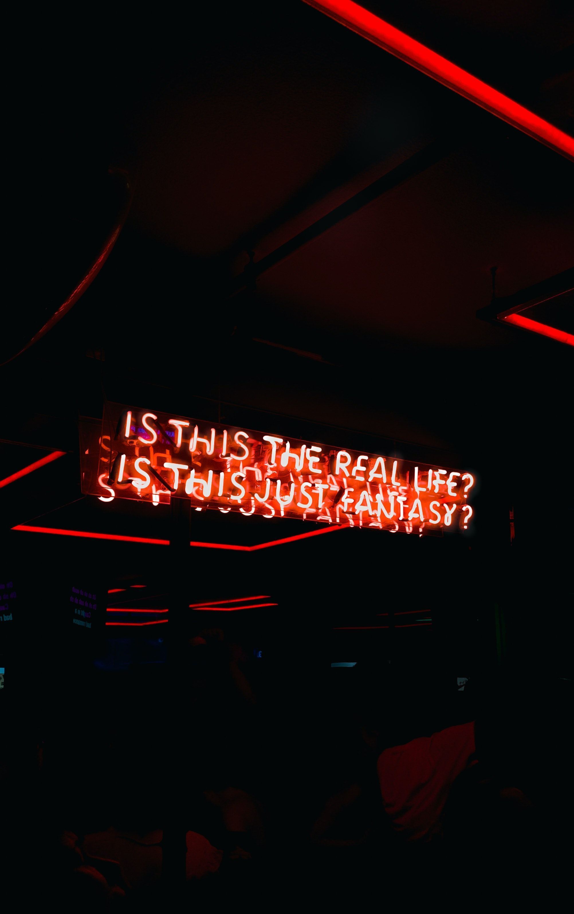 Red neon sign with the words 