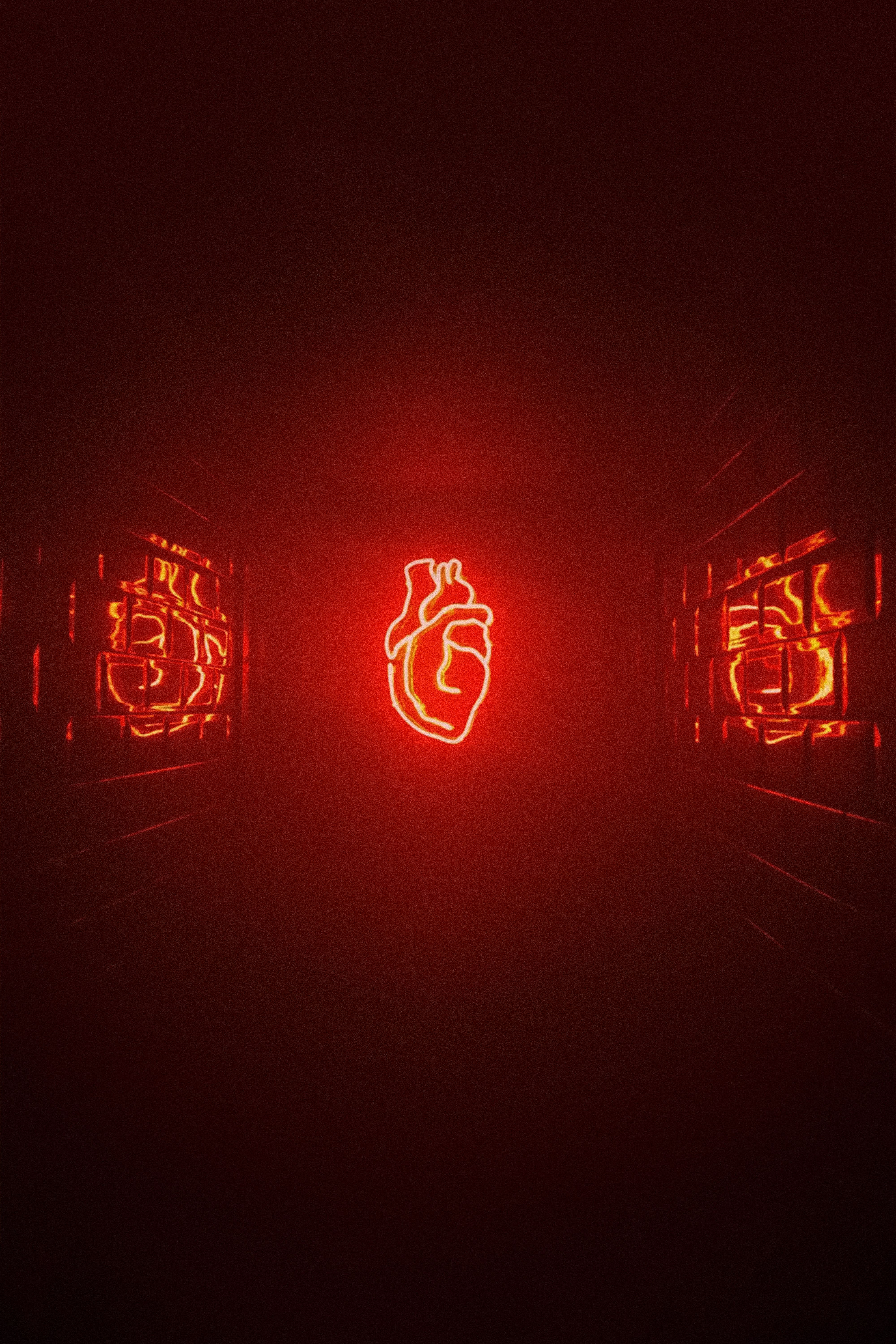 Red neon sign of a human heart - Neon red