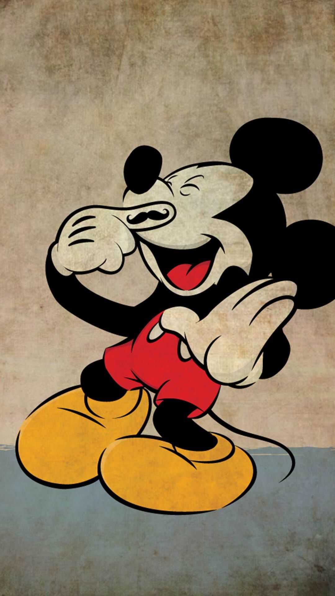 A mickey mouse cartoon character with his mouth open - Mickey Mouse