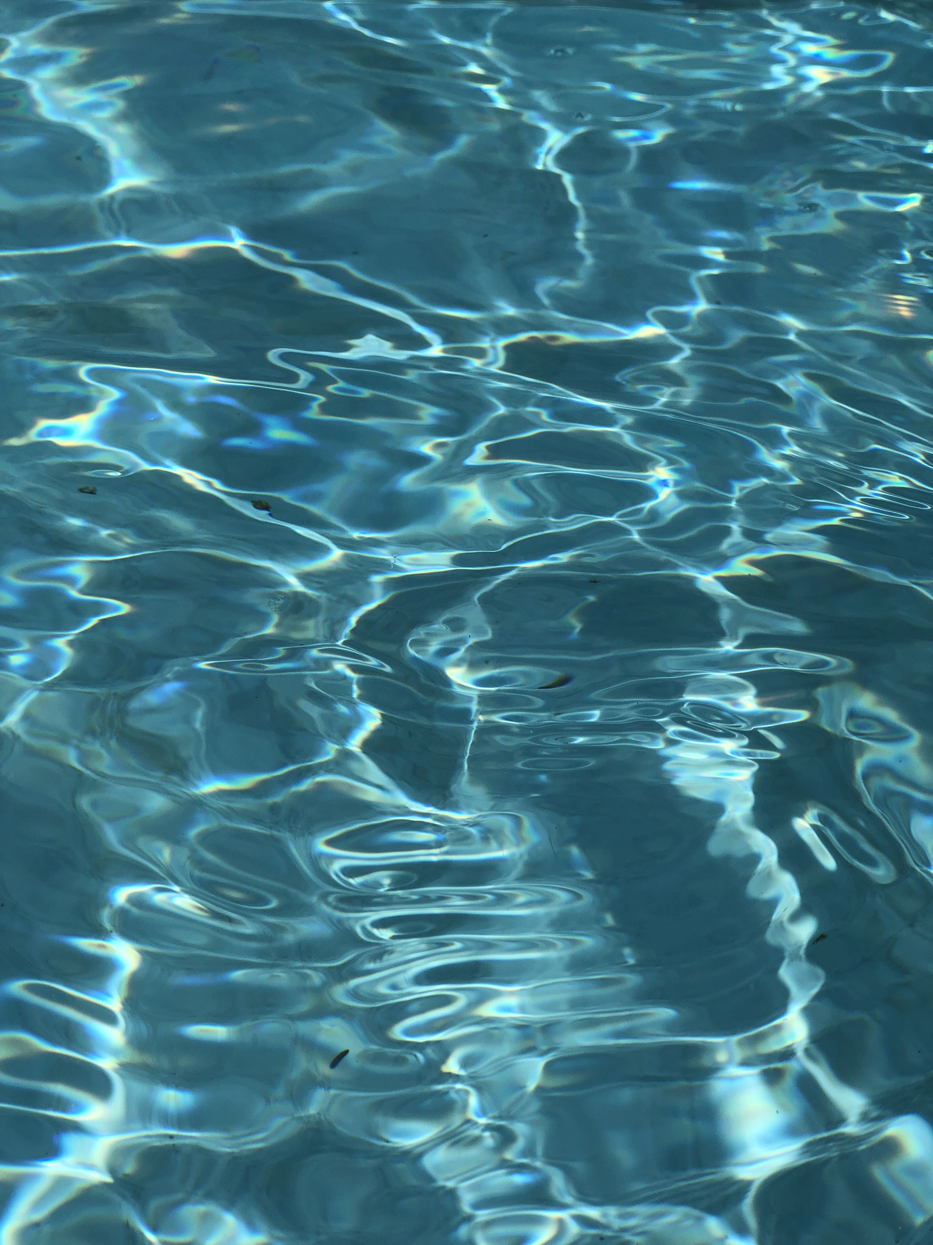 A pool of water with ripples and light reflecting off the surface. - Water, underwater, wave, aqua