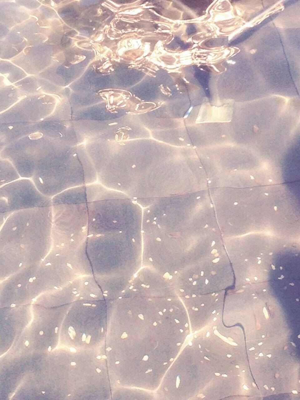 The sun reflecting off the water in a pool - Water, underwater
