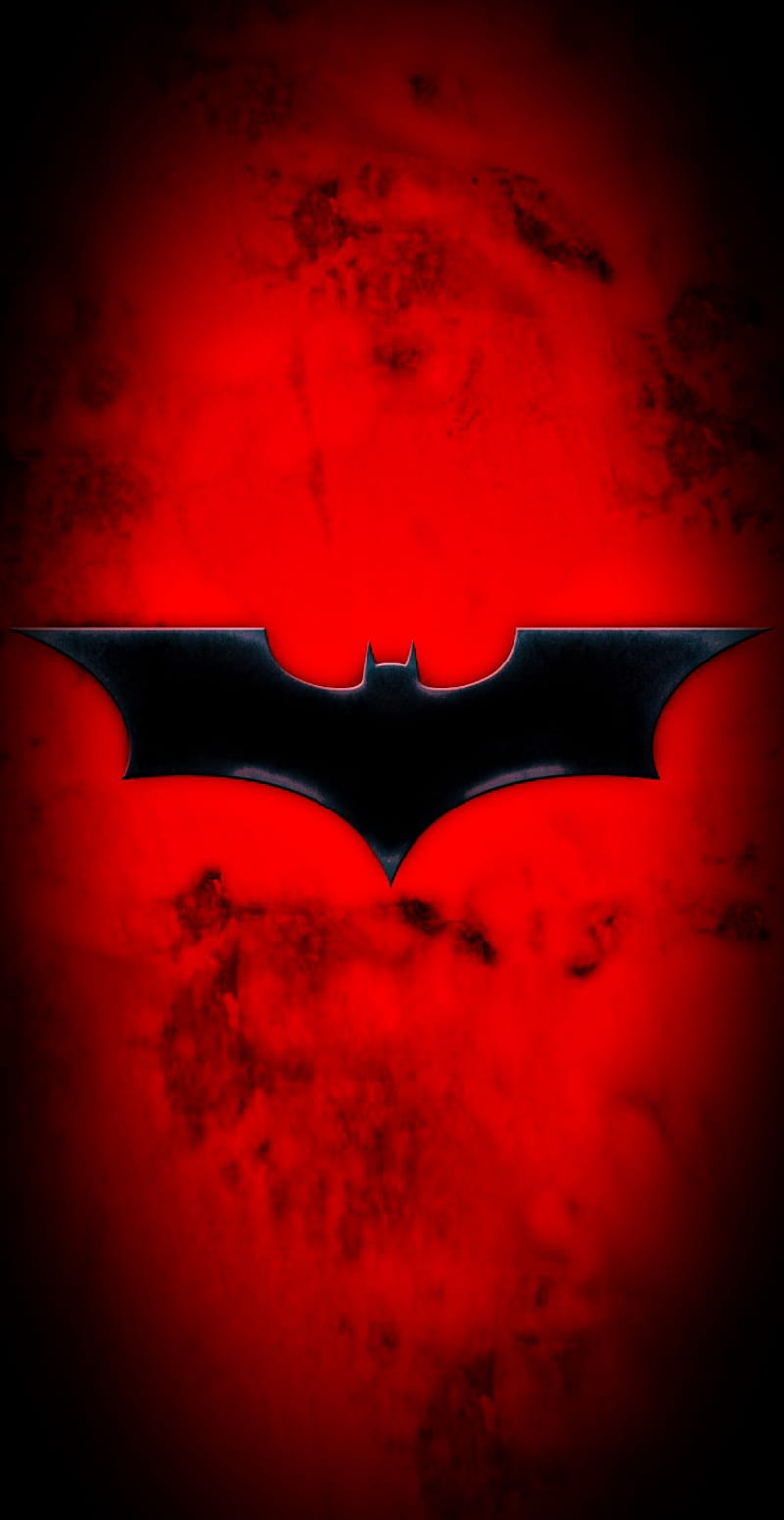 The batman logo on a red background - Batman