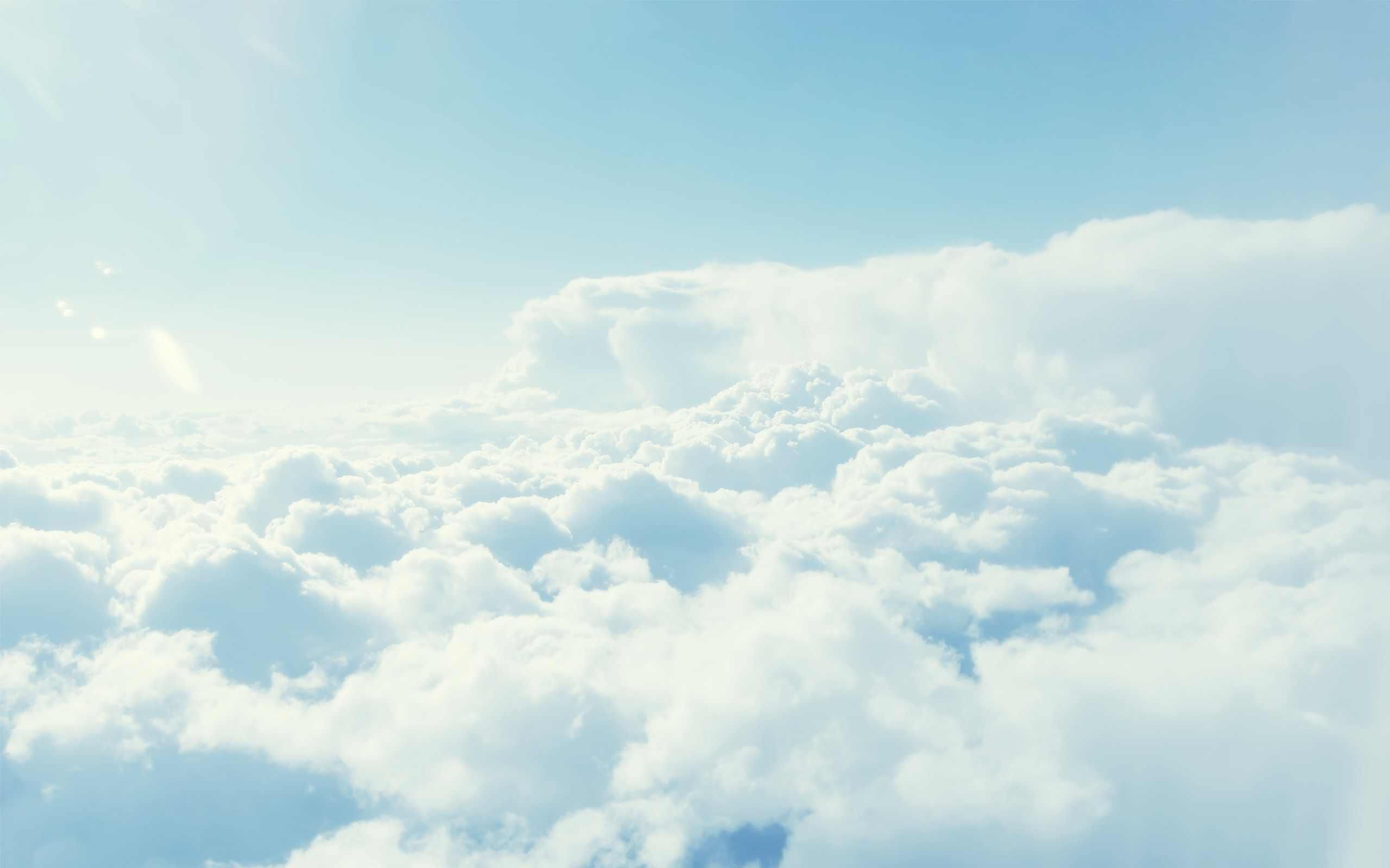 A plane flying over the clouds on an sunny day - 2560x1600, cloud