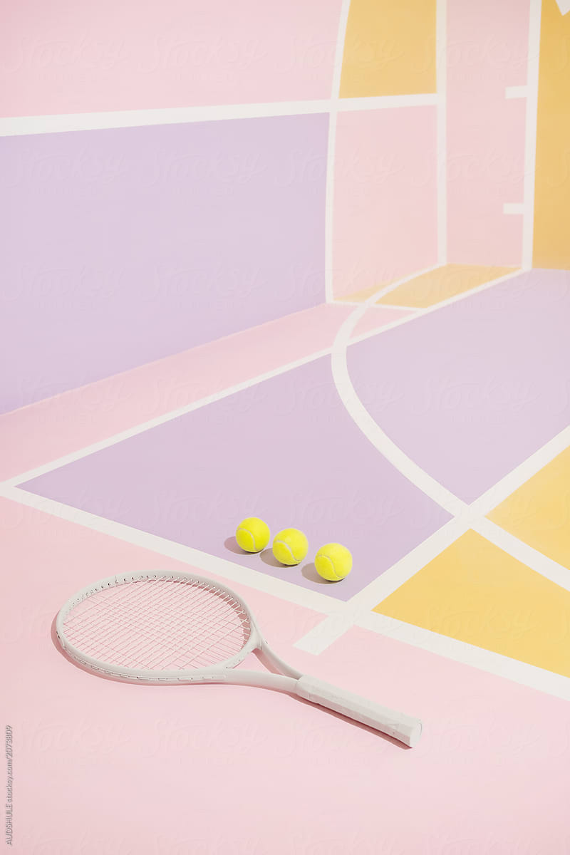 Tennis Balls And Racket On Colorful Course.- Stocksy