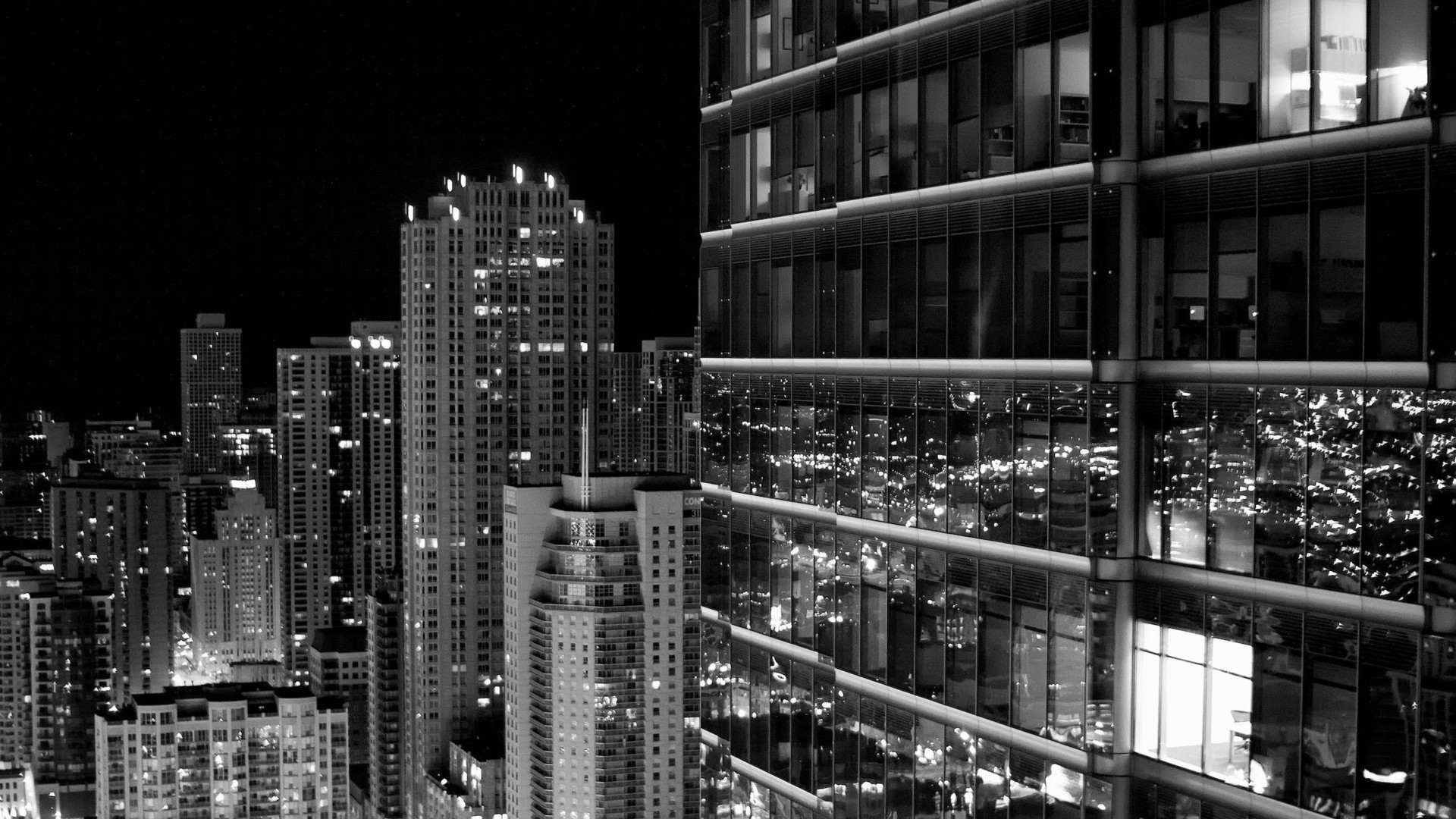 Black and white photo of a city at night - Black and white