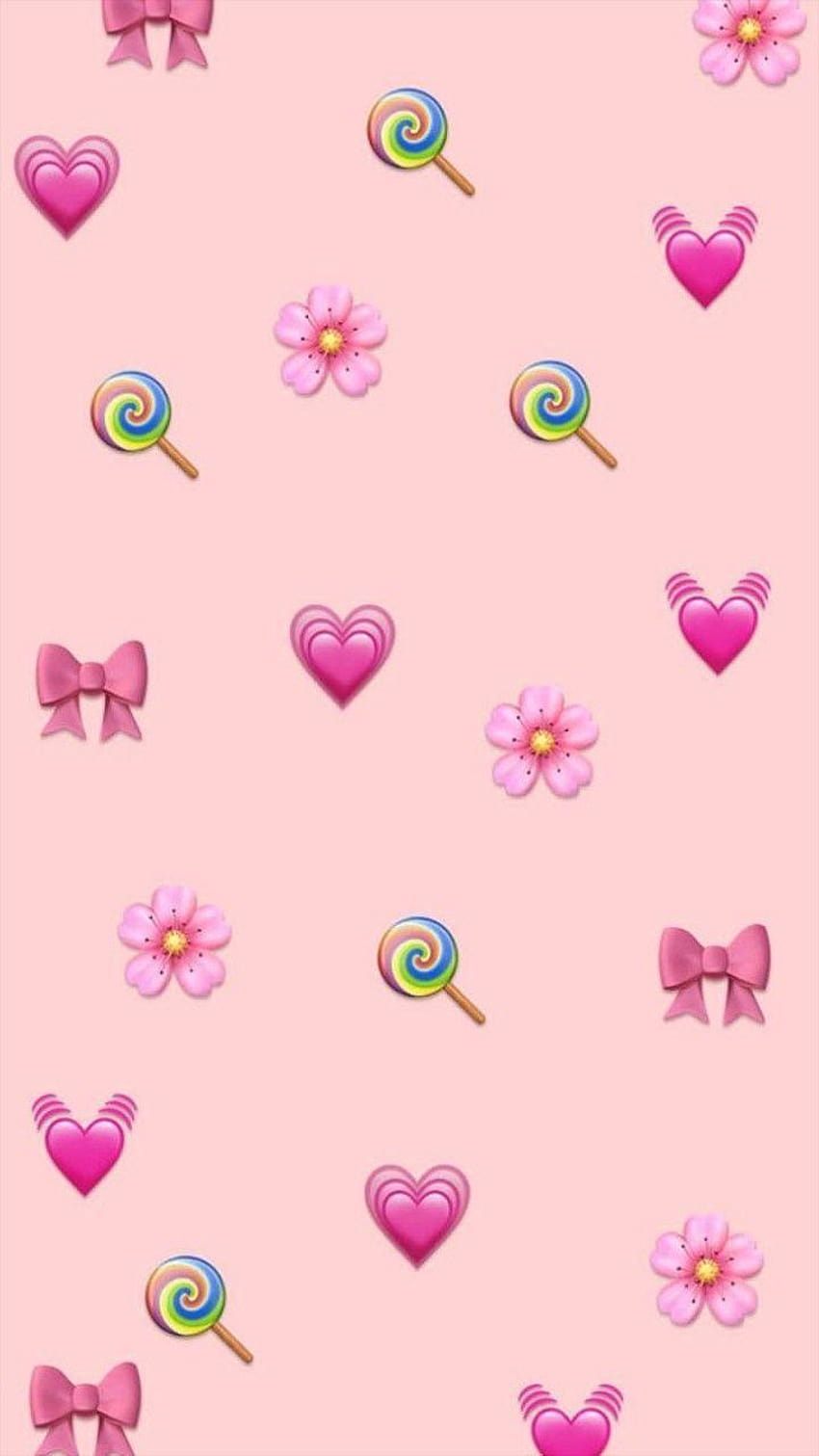 A pink background with hearts, lollipops and candy - Emoji