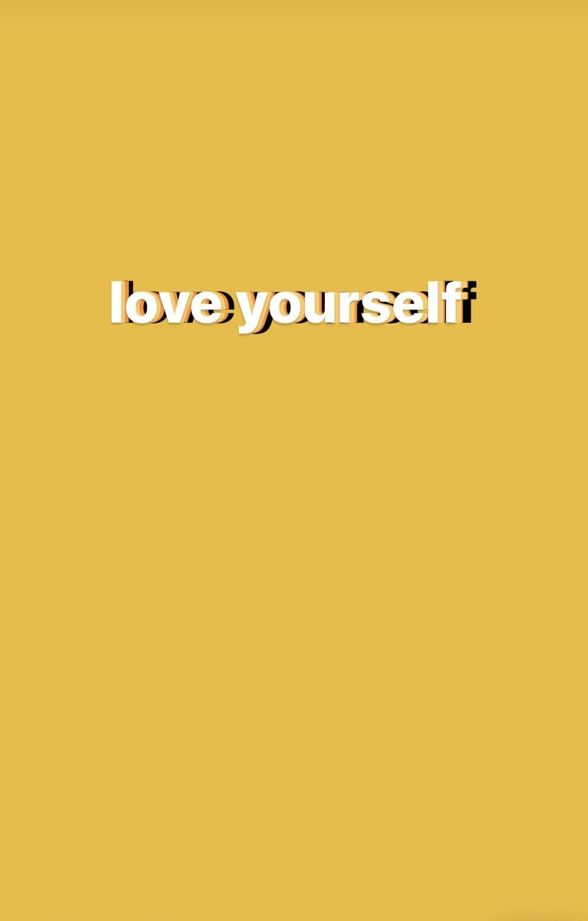 A yellow background with the words love yourself - Pastel yellow