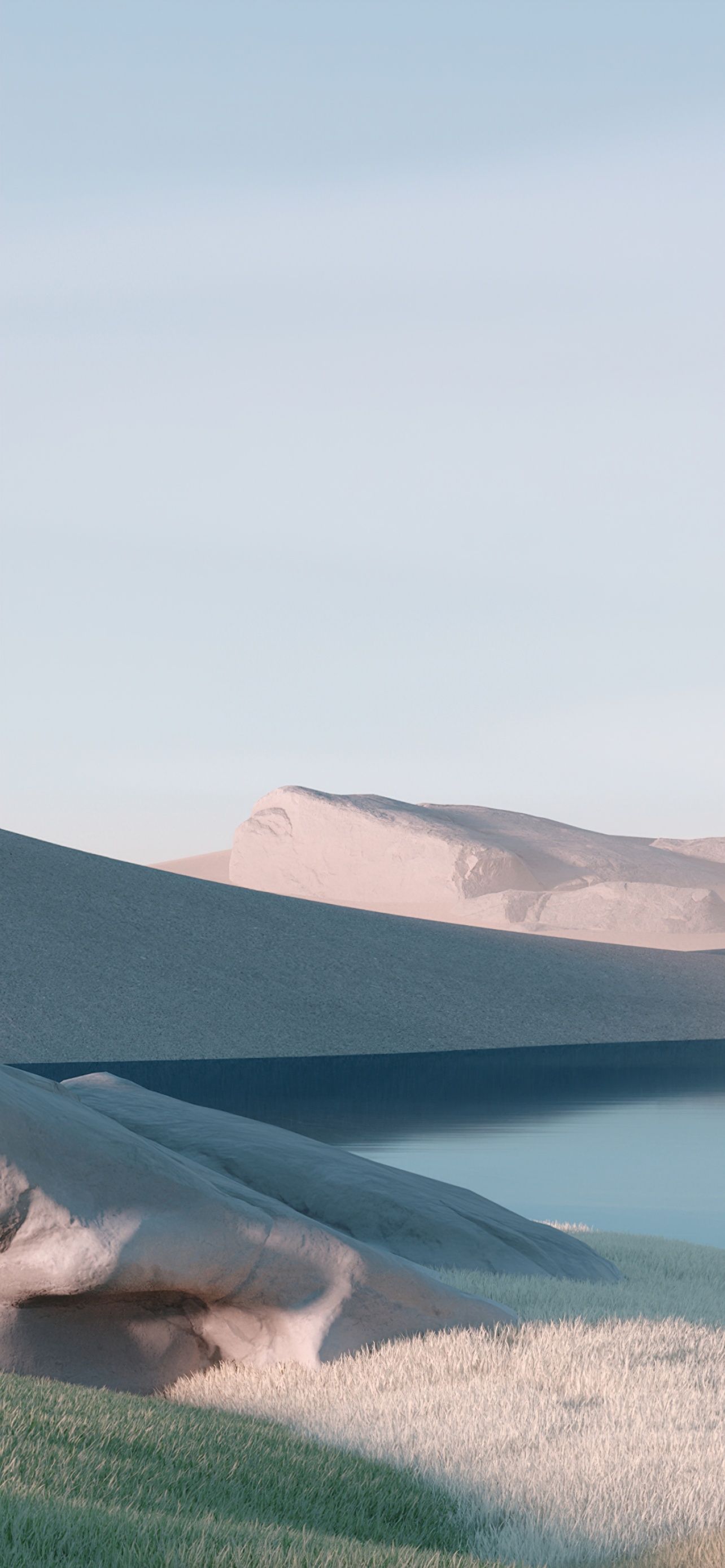 A serene image of a grassy hillside with a blue sky. - Desert