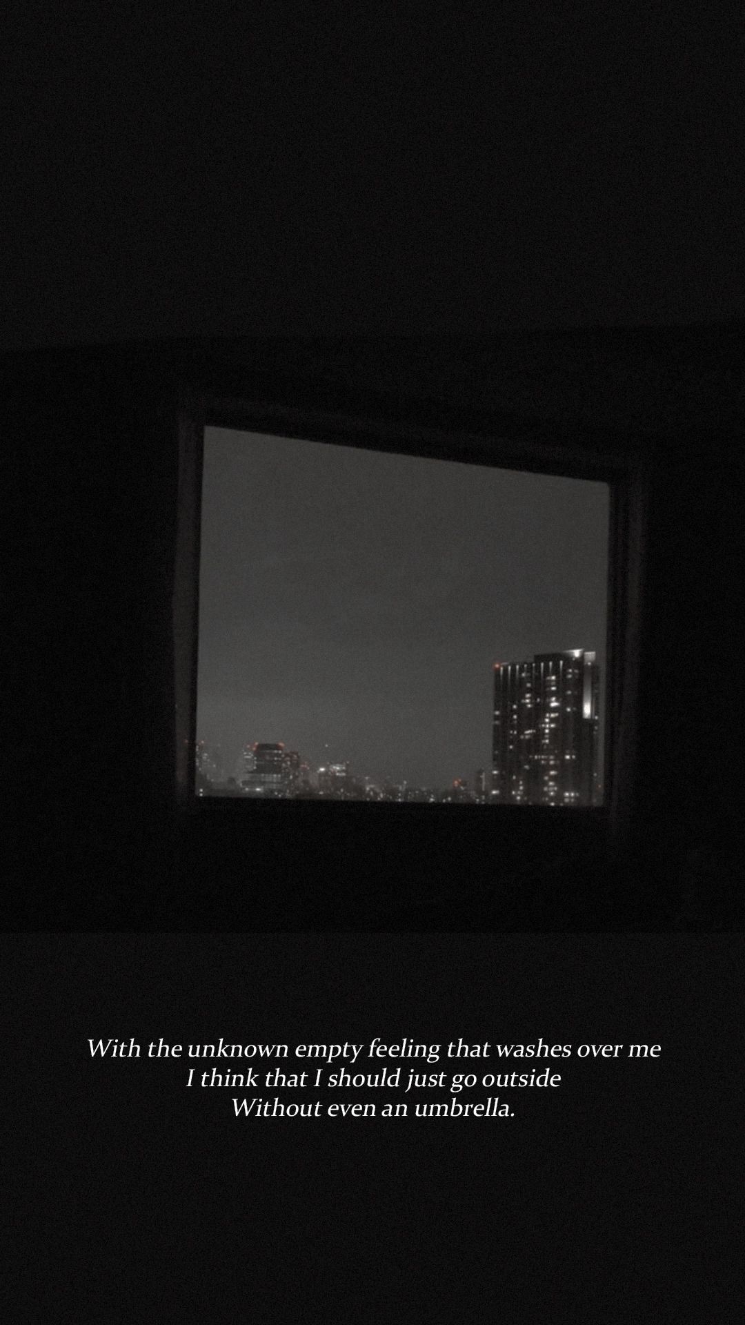 A dark room with the words, 'the city that never sleeps' - Black quotes