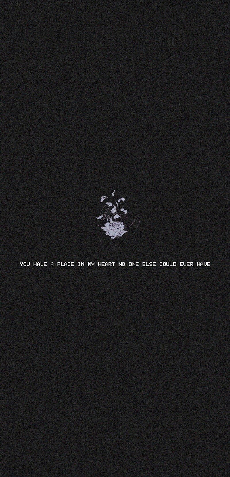 Black background wallpaper with a quote that says 