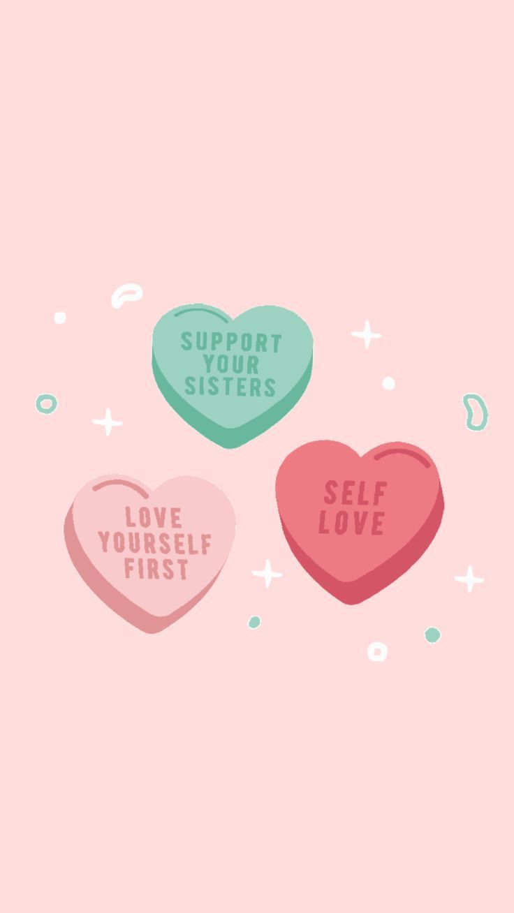 Three heart shaped candy with the words self love, trust and believe - Positivity