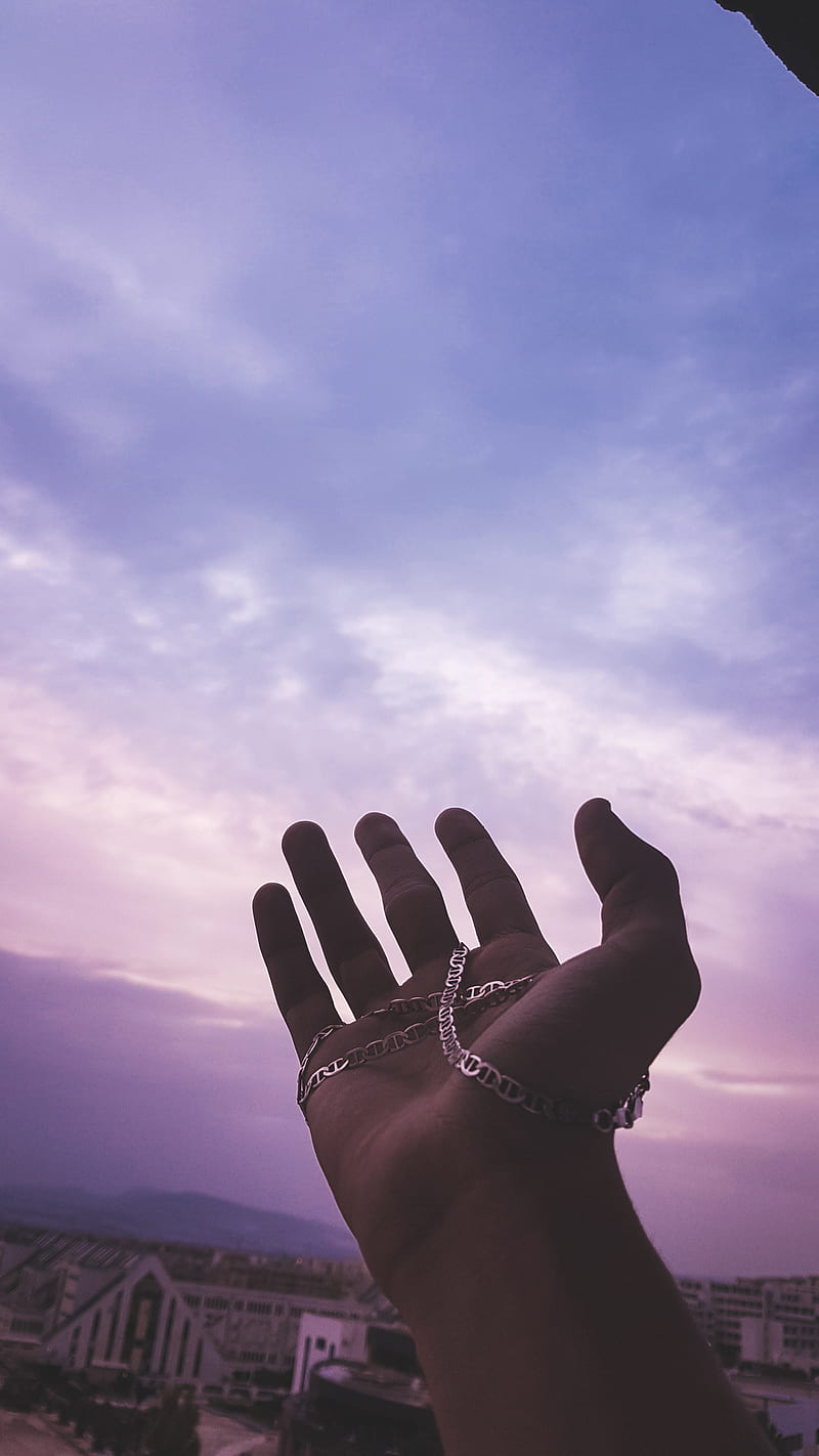 A hand reaching up to the sky - Spiritual