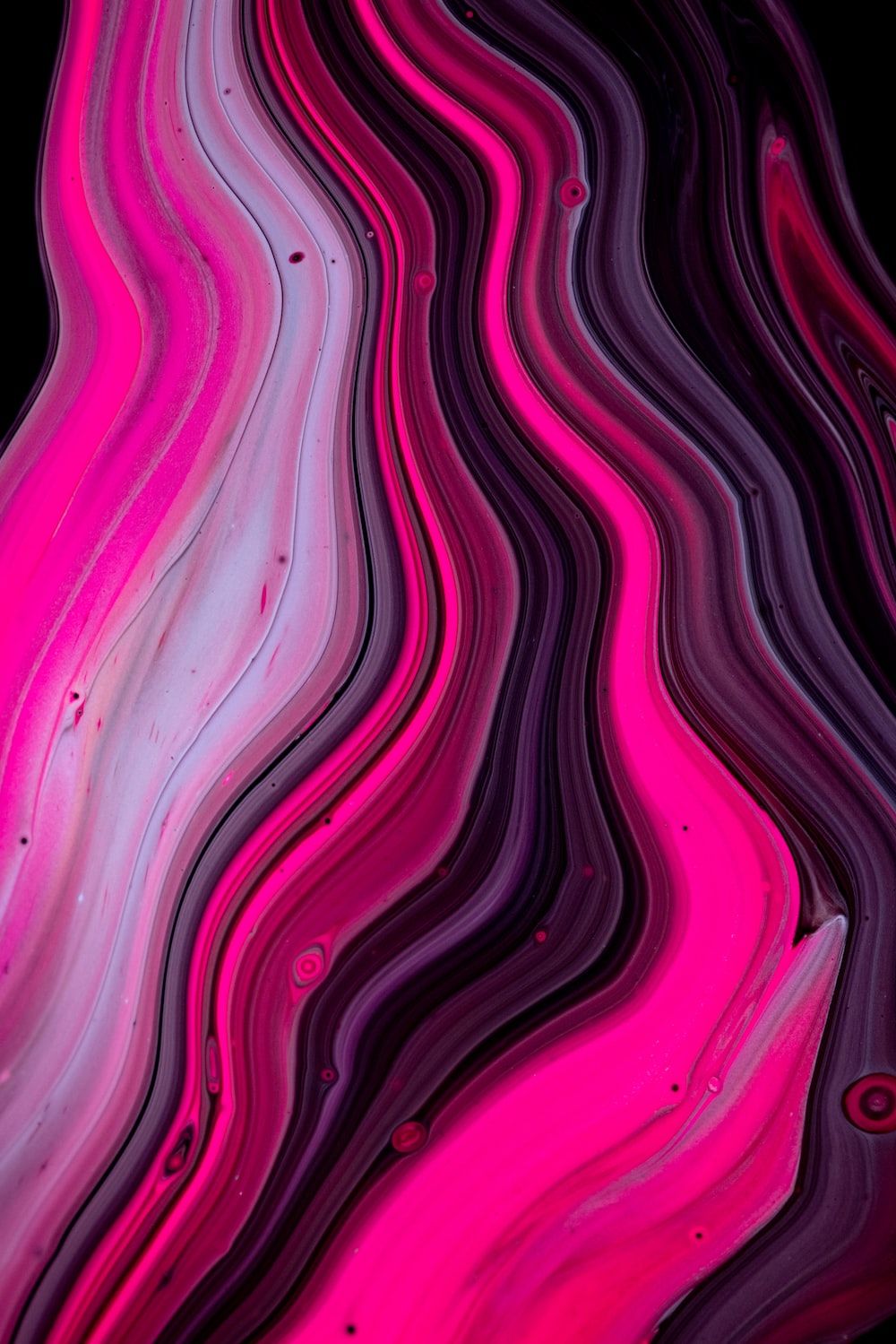 A pink and black abstract design - Magenta