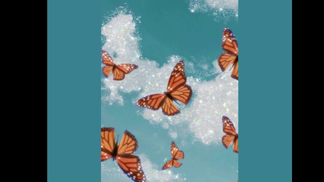 A group of butterflies flying in the sky - Teal, butterfly