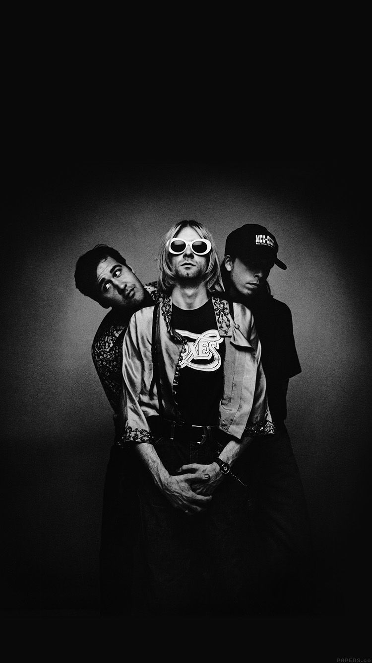 IPhone wallpaper of Nirvana with the image of the band members in black and white. - Nirvana