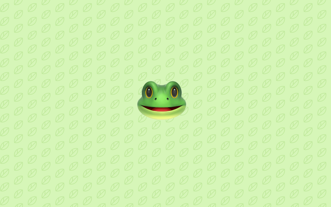 A green frog with big eyes on the wall - Frog