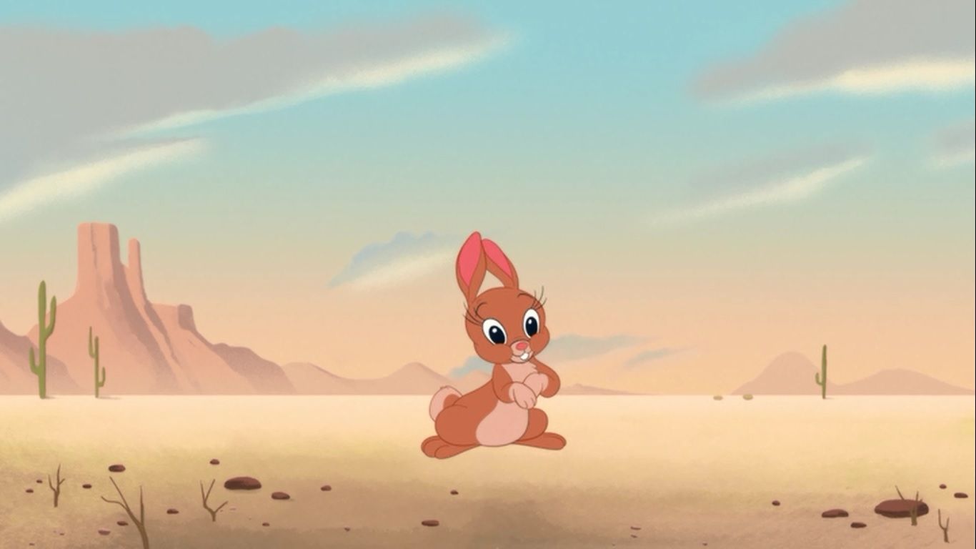 A cartoon character is standing in the desert - Looney Tunes