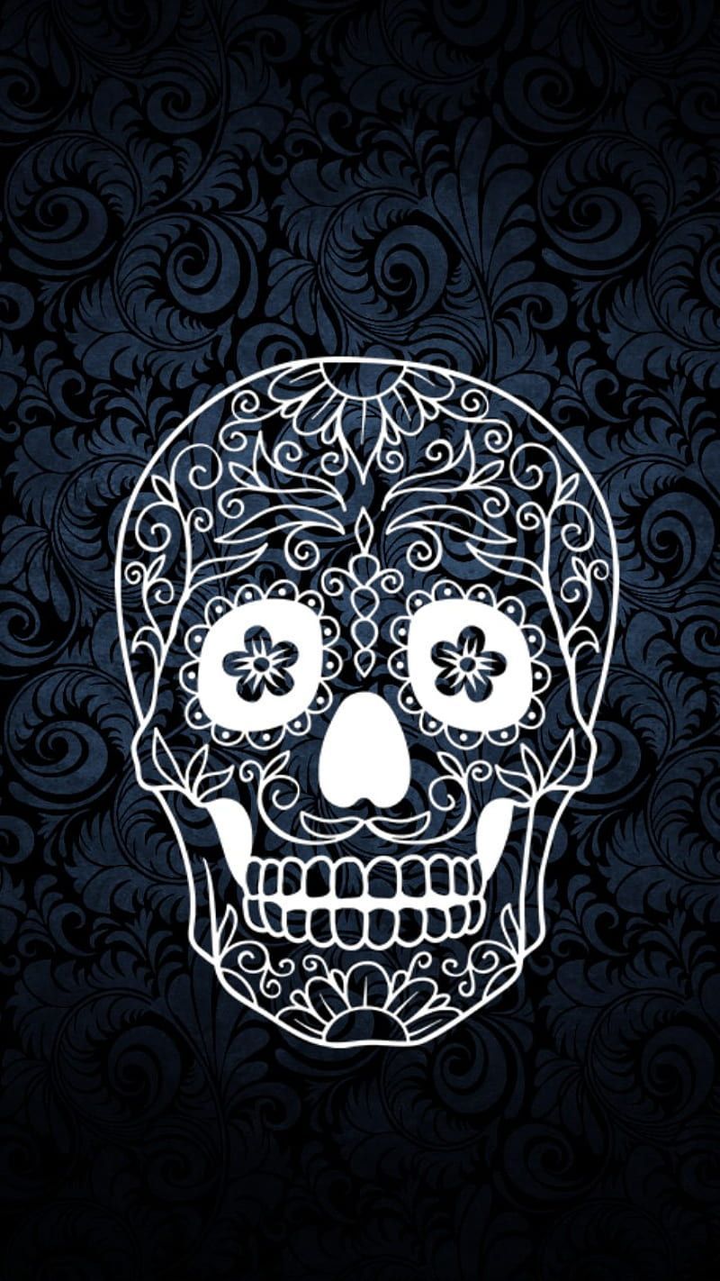 A white skull with black and blue swirls - Mexico