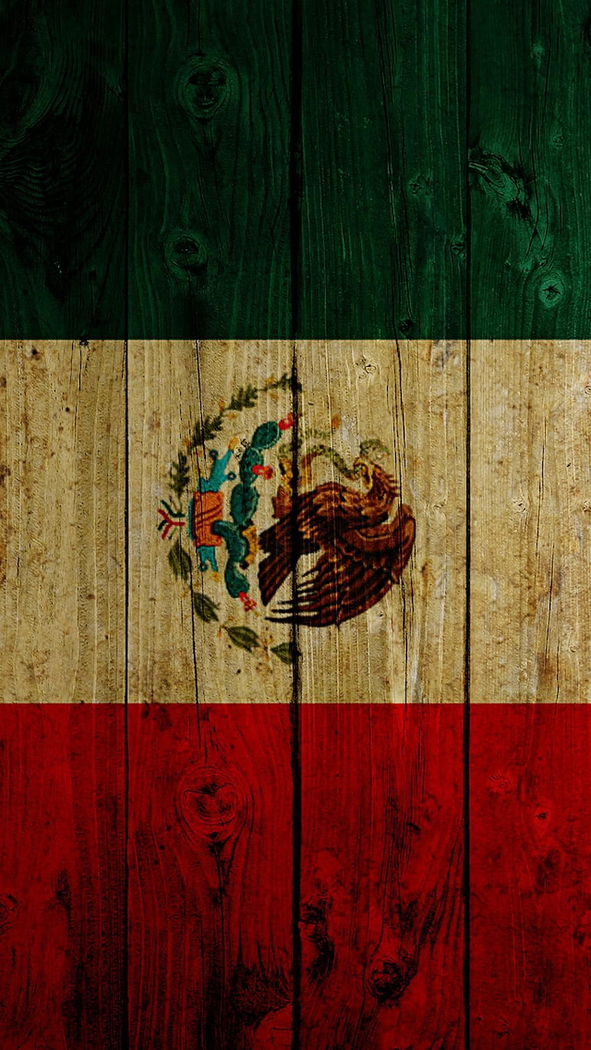 Mexican flag on a wooden background - Mexico