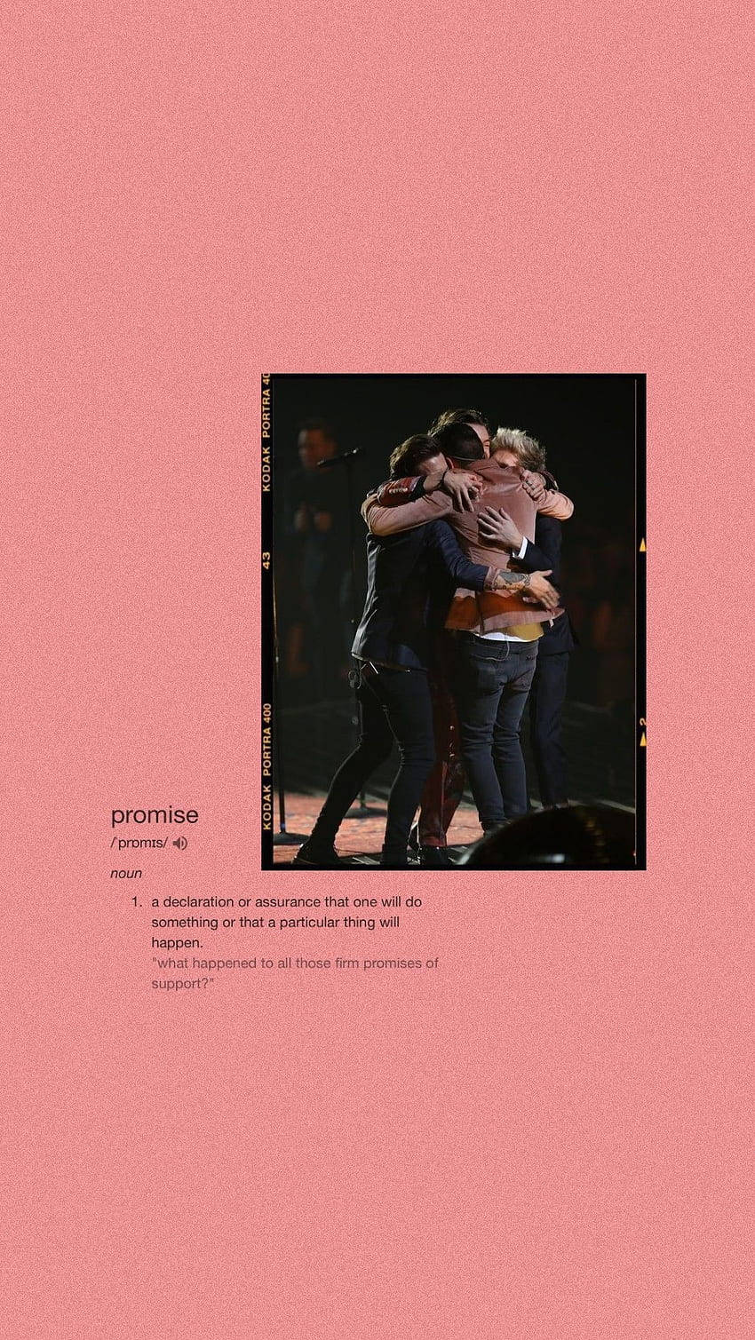 A picture of people hugging on stage - One Direction