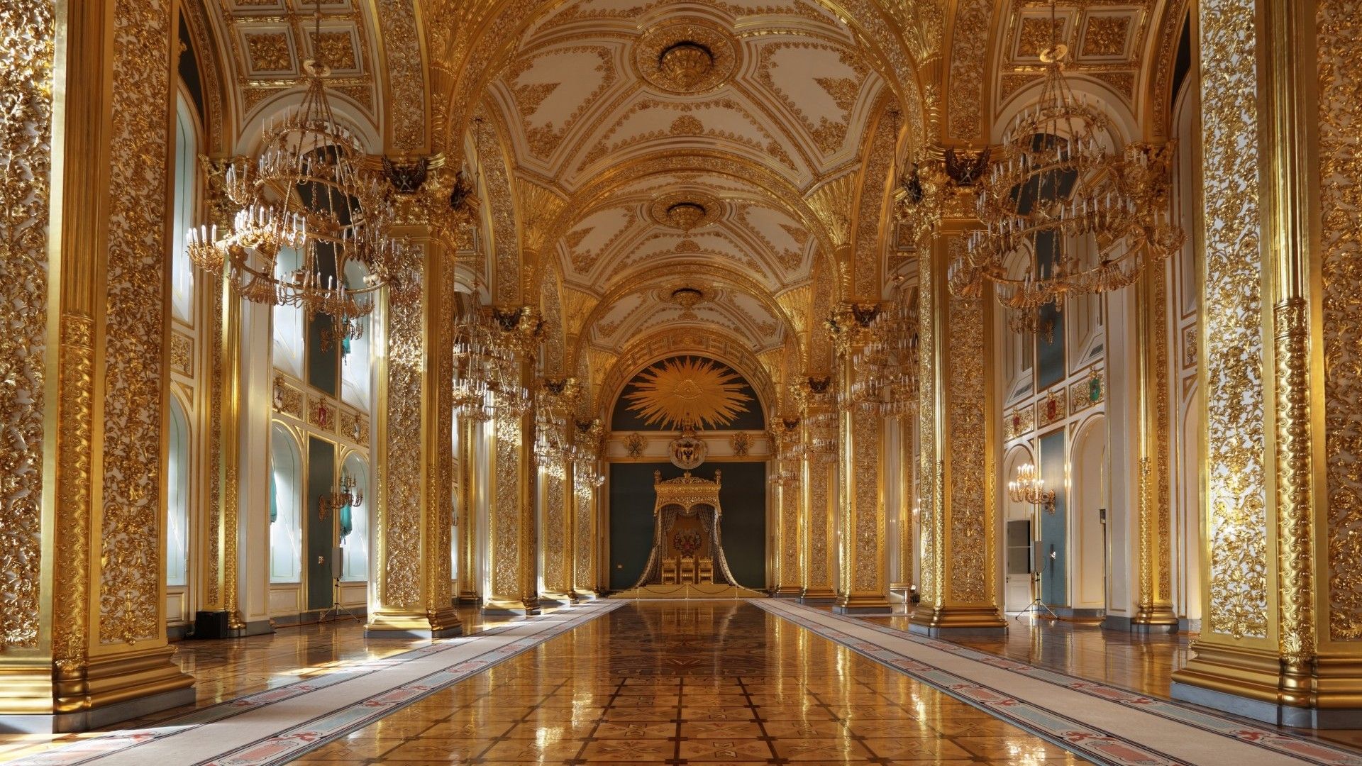A long hallway with gold decorations on the walls - Royalcore
